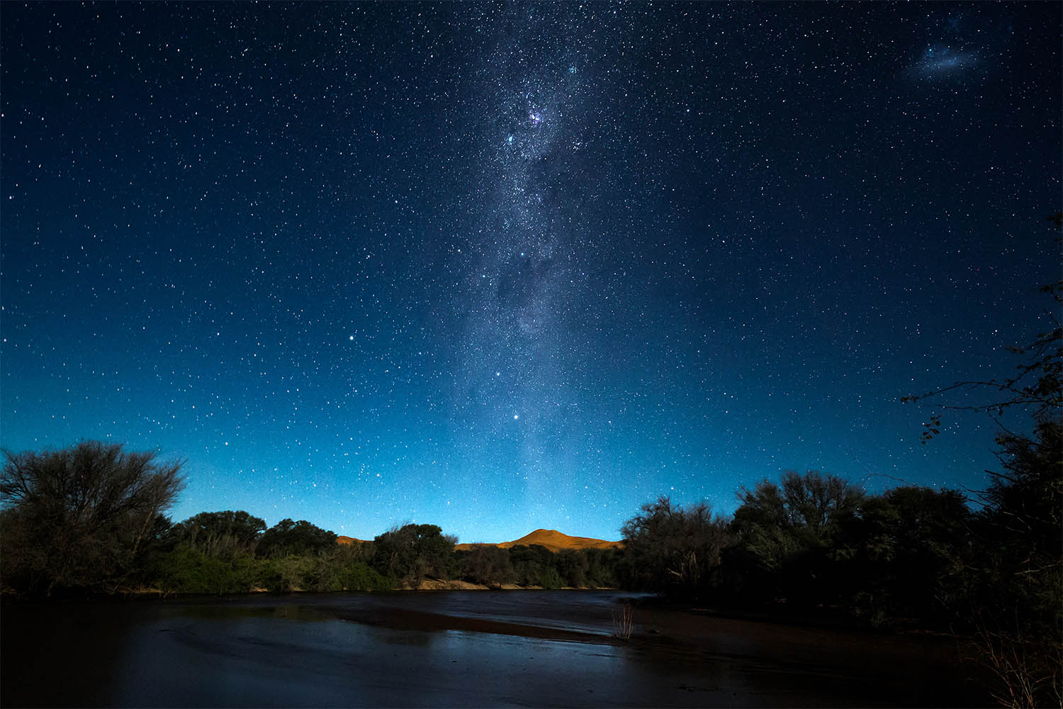 The Kuiseb River flows at night in the central Namib Desert