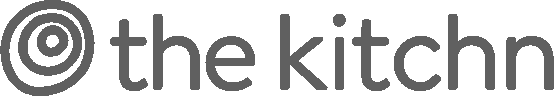 Logo of the brand 'The Kitchn' with a spiral icon to the left.