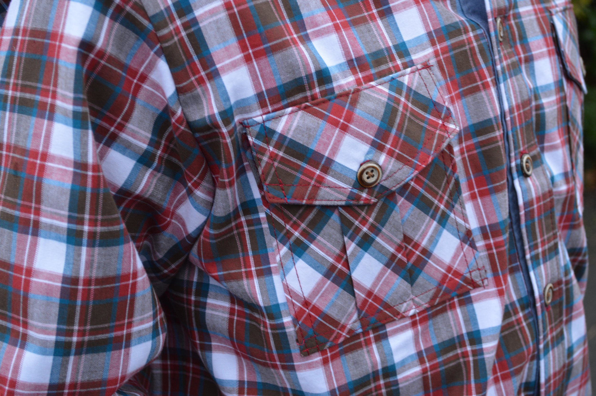 It's all in the details! Front pockets cut on the bias, top stitched and pleated. 