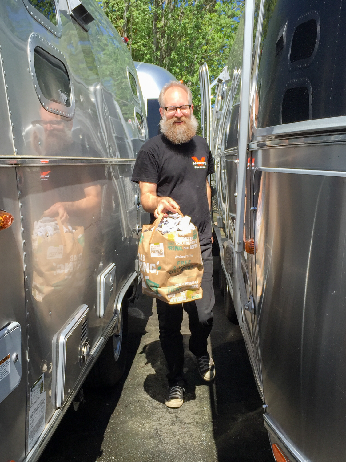 It's a tight squeeze moving our stuff to the loaner through all the shiny Airstreams.