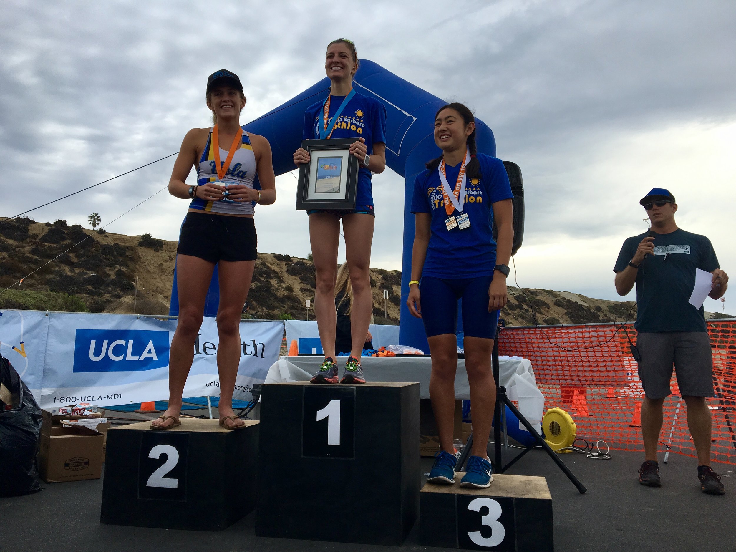 Logan and Sarah on the woman's collegiate podium