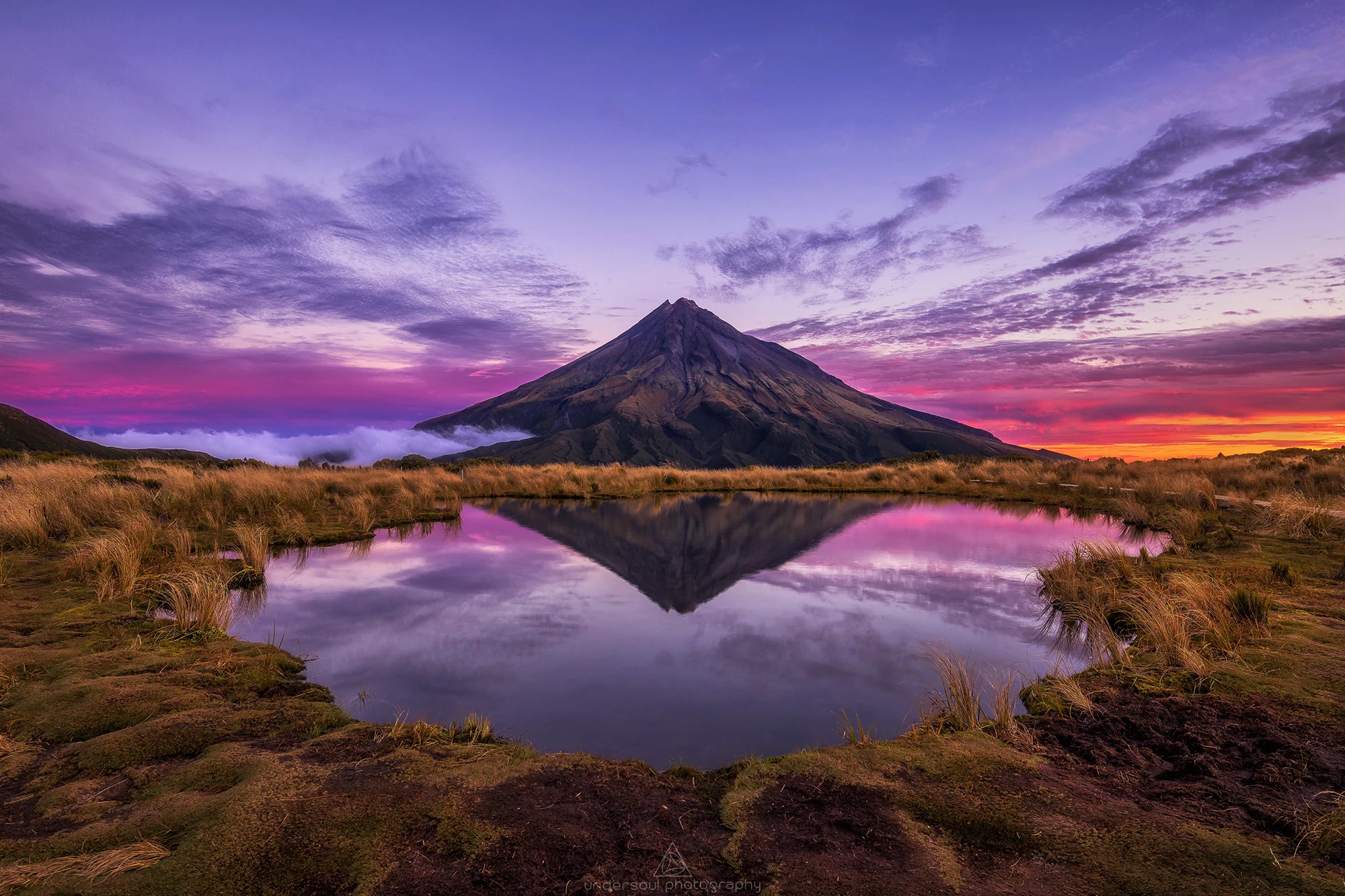 The famous tarn on the Pouakai Range, overlooking Mt Taranaki