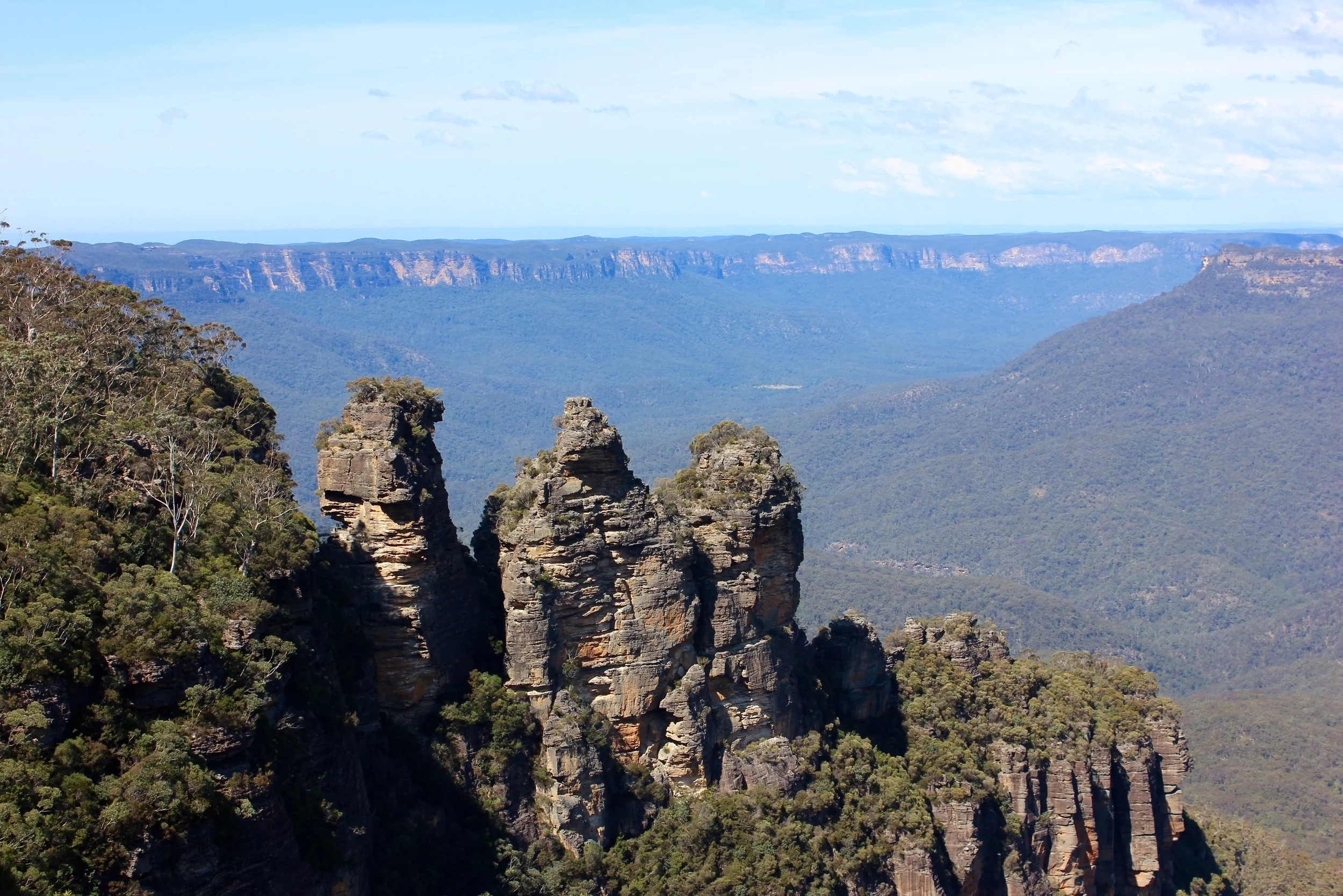 Three Sisters (Blue Mountains) - they get their blue look from the gas emitted by the Eucalyptus plants. 