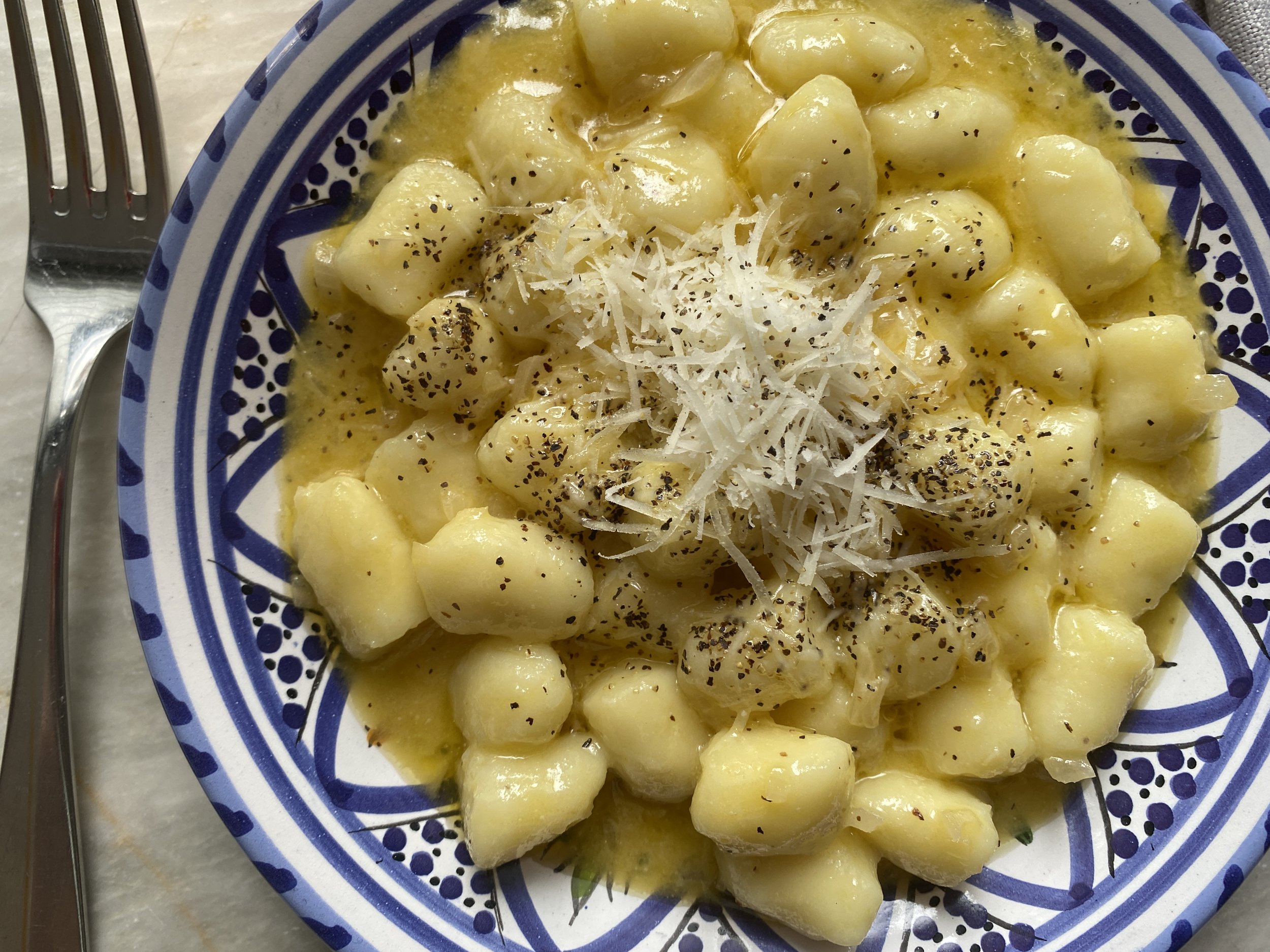 Gluten free potato gnocchi with creamy chardonnay sauce