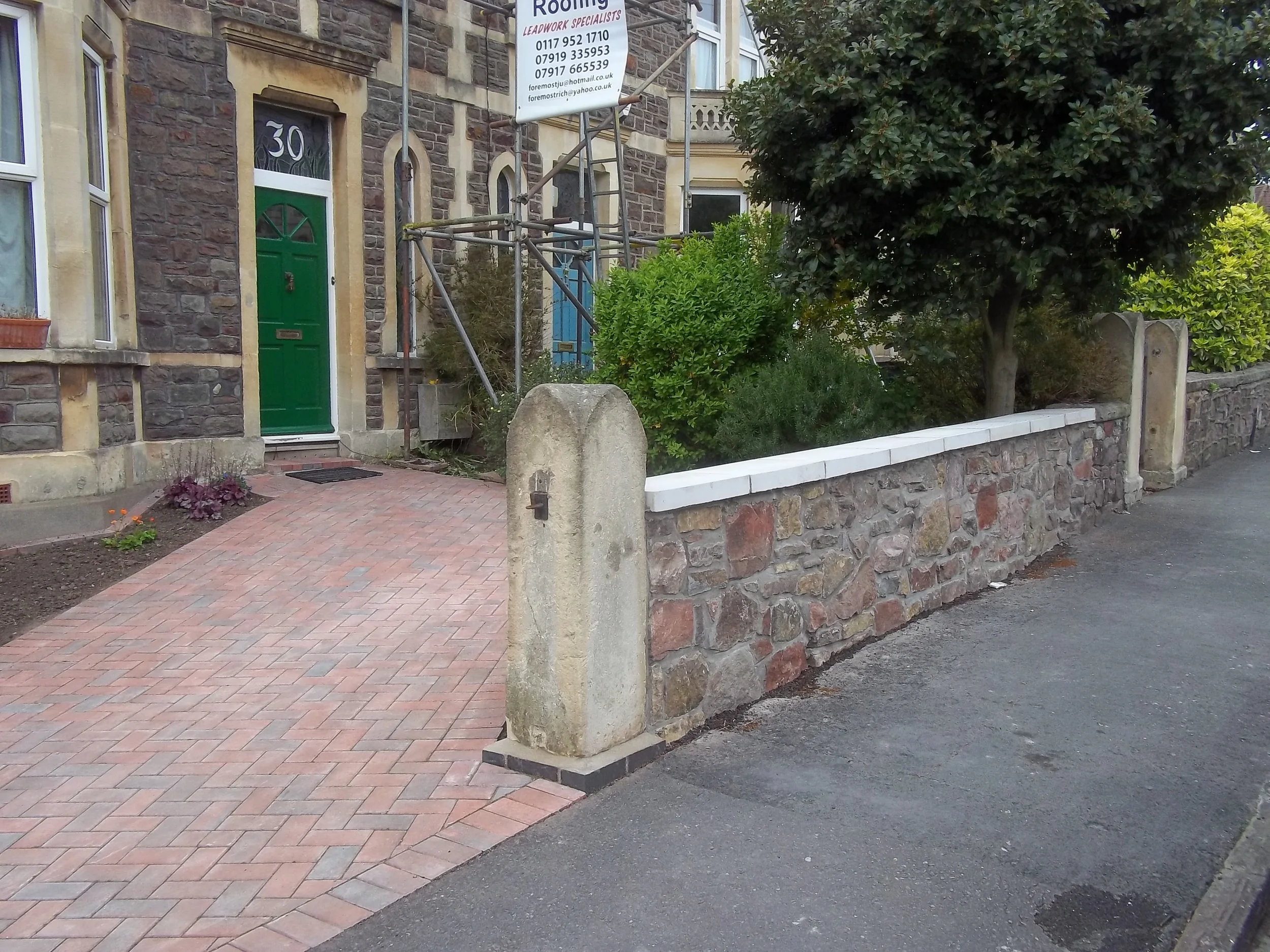 bock paving with stone wall.JPG