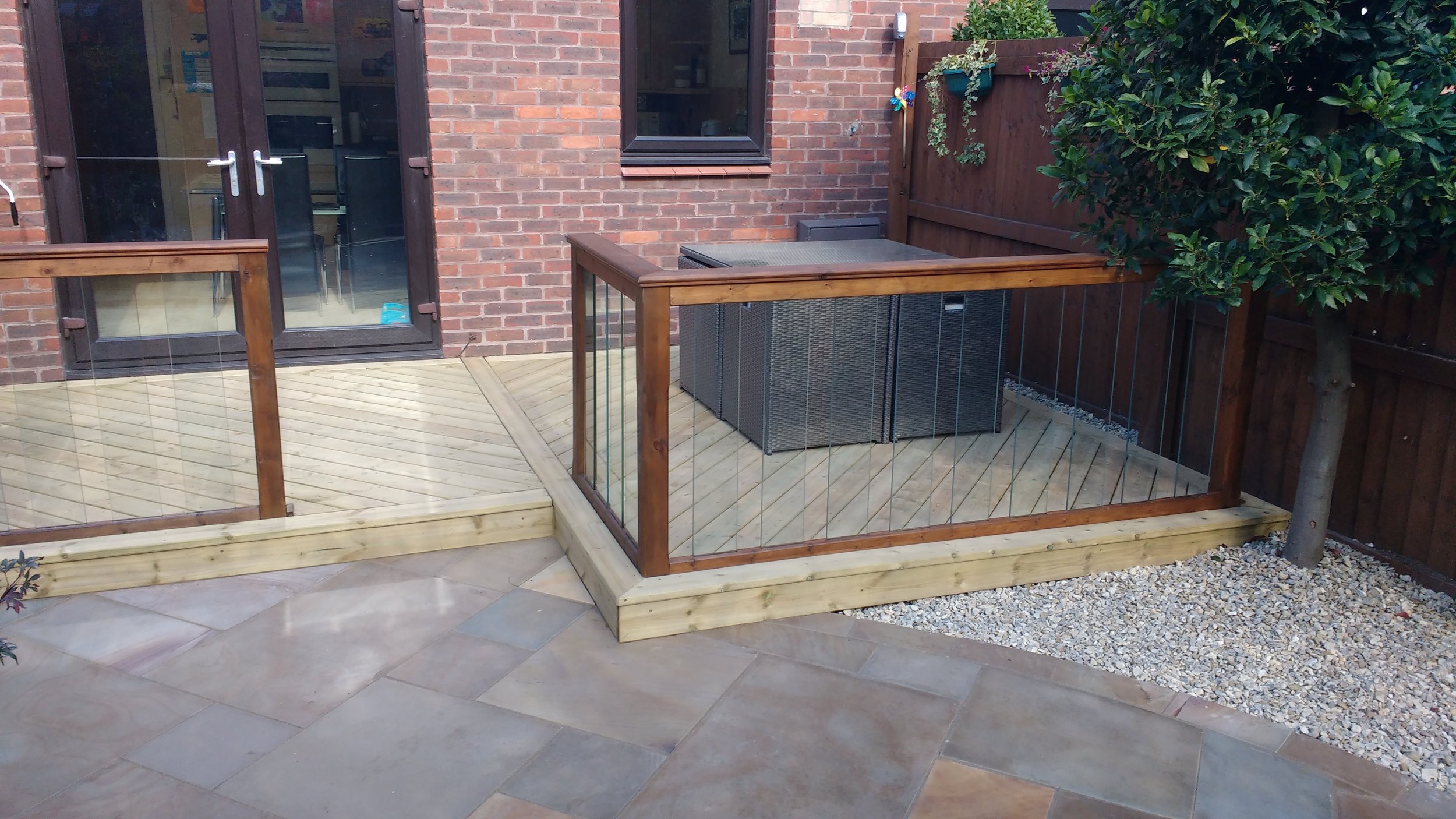 decking with glass balustrade.jpg