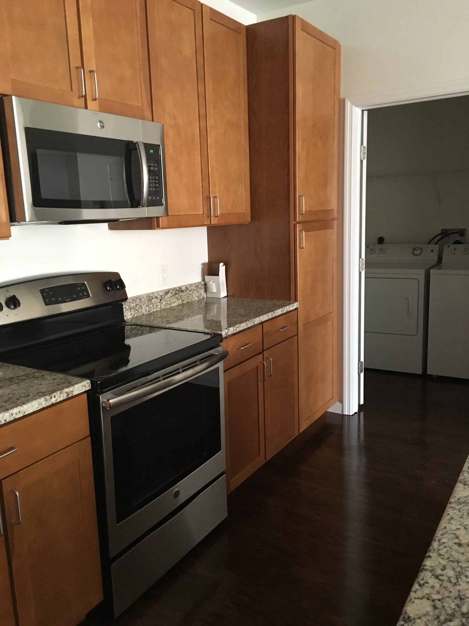 three-bedroom kitchen into laundry room apartment.jpg