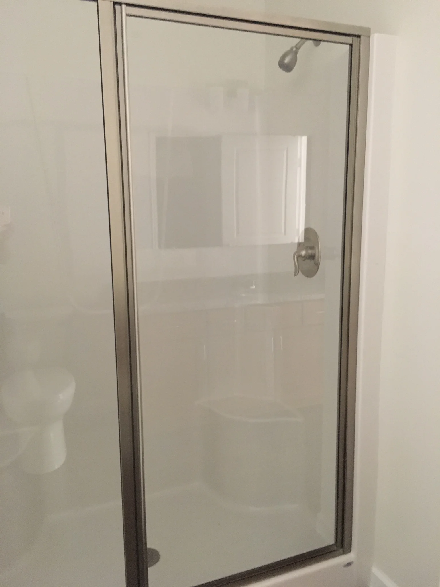 shower in bathroom in two-bedroom apartment on second floor.jpg