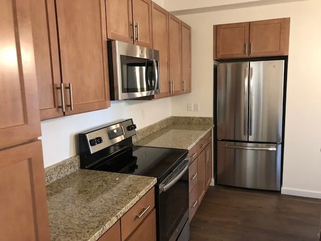 one bedroom with appliances in kitchen.jpg