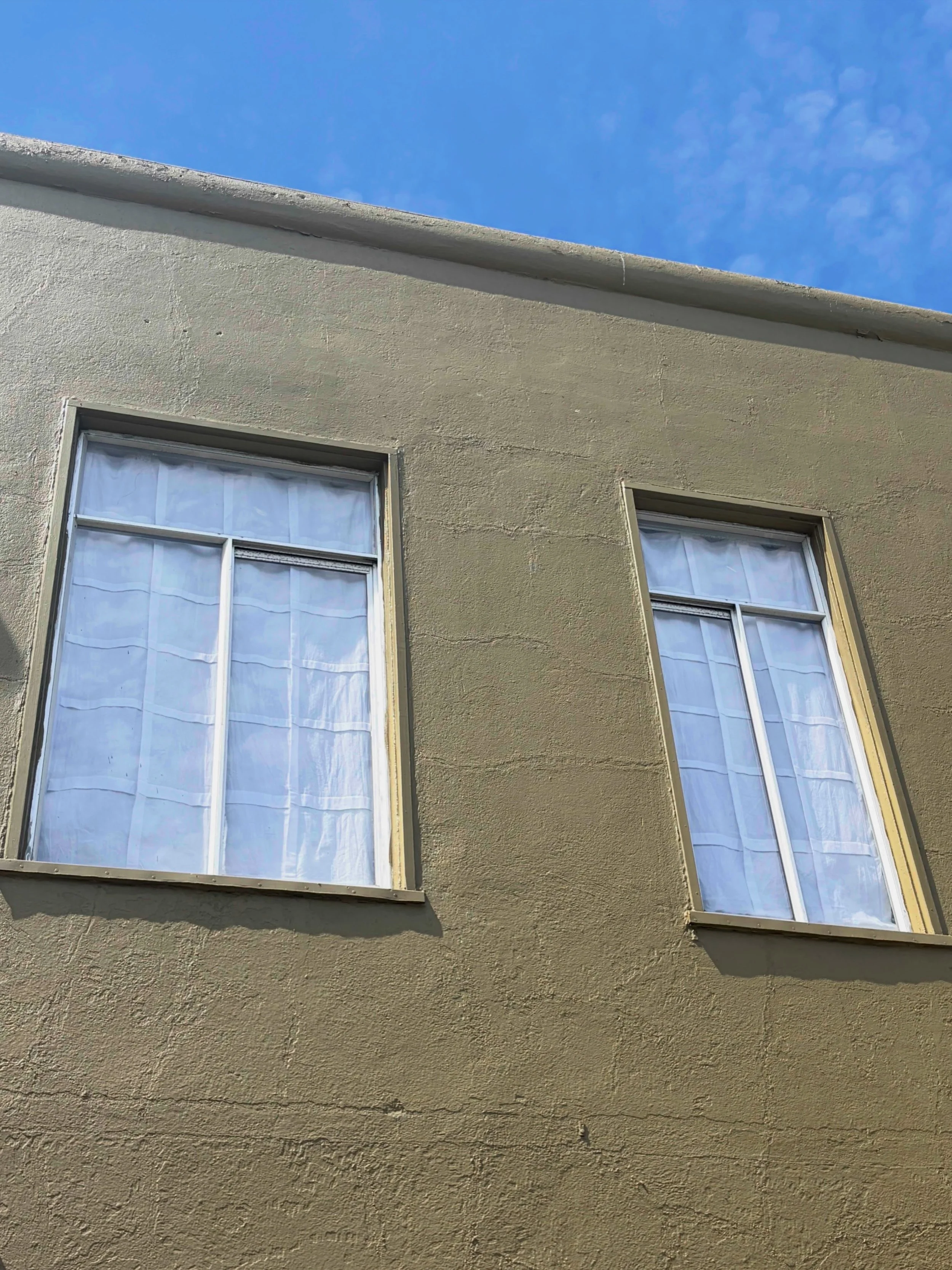 Gridded windows at the studio above @black.crate