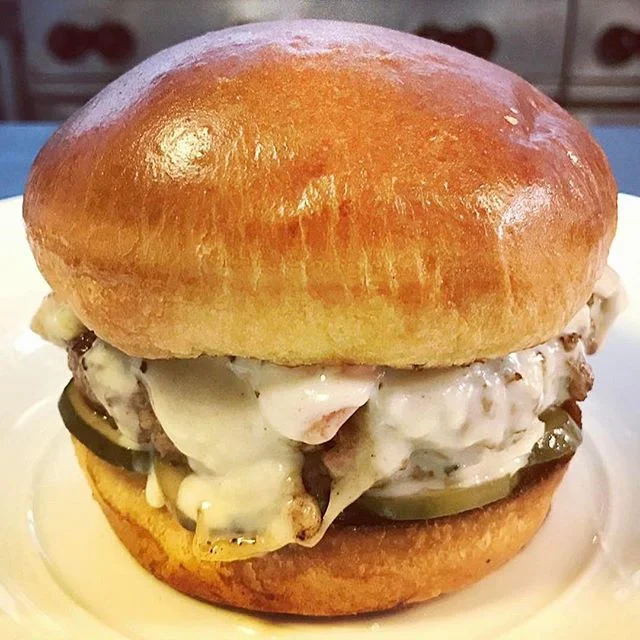#3courses: 2 of 3
Back to #sweethome #Chicago and our friends at @acadiachicago for some (properly proportioned) Michelin #comfortfood!
#foodie #bucketlist #luxurytravel #🍔: @acadiachicago
・・・
this is what a two star michelin burger looks like! truffle mornay, gruyere cheese, onion, bread and butter pickles, house slab bacon! available at the Acadia bar! #acadiachicago #jamesbeard #aaafivediamond #twostarmichelin #twostars #burger #bestburgerever #deliciousgluttony