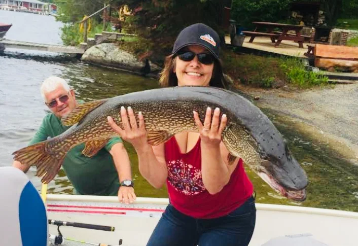 Doreen's hefty, and it was huge, Northern. As she noted, Gil didn't bring their rods, so this was caught on a "Junior" rod and reel from CT. But, Gil did supply the secret bait.... and he got it in the boat!