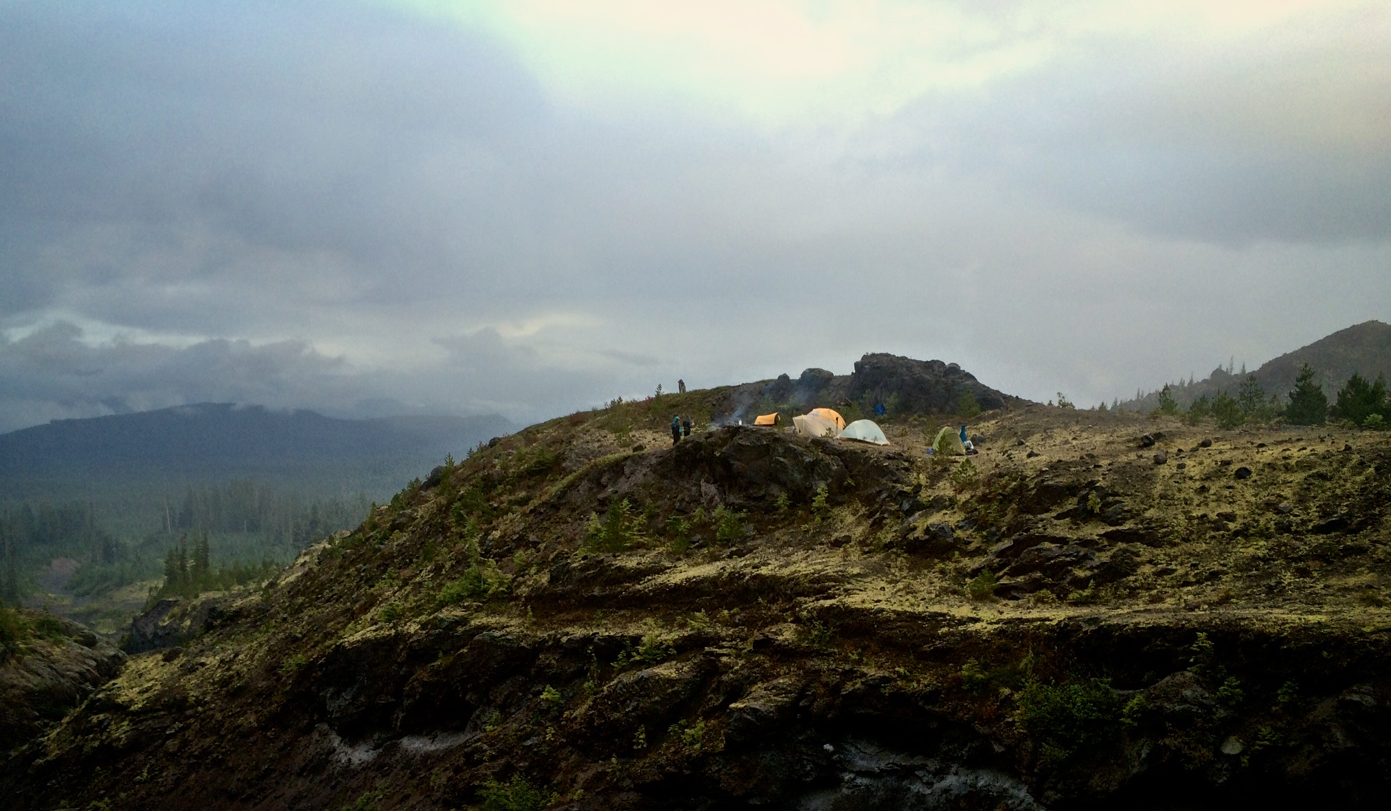 The downside to camping on a volcano is there is rarely a flat spot. When you find one you make do. This location may have been exposed to the rain, but it also kept us all together and afforded a nice windbreak.
