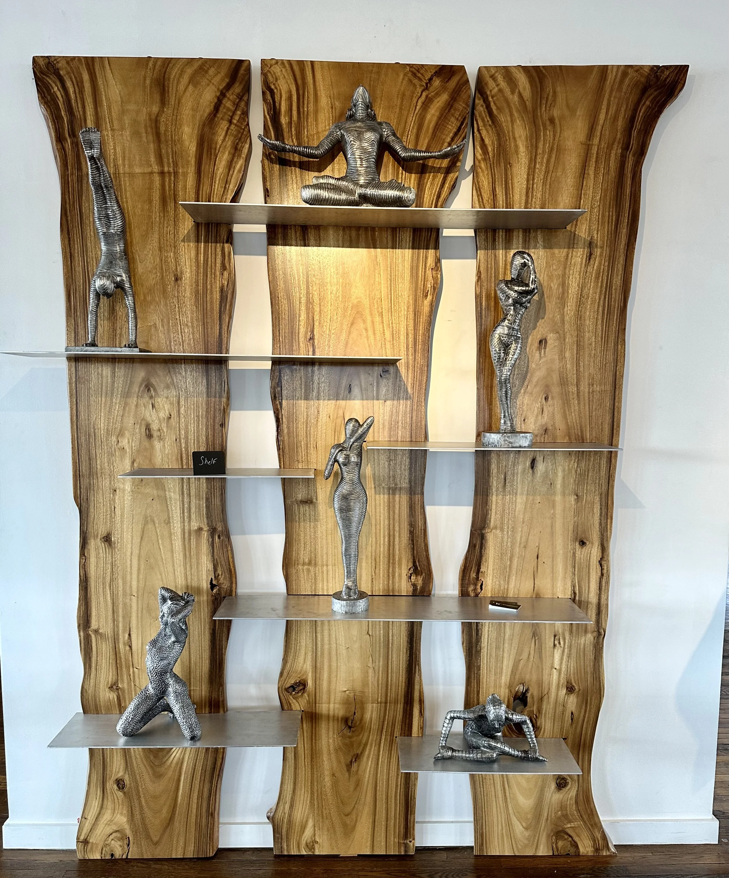 Shelf Wall with Timboel Figurines.jpg