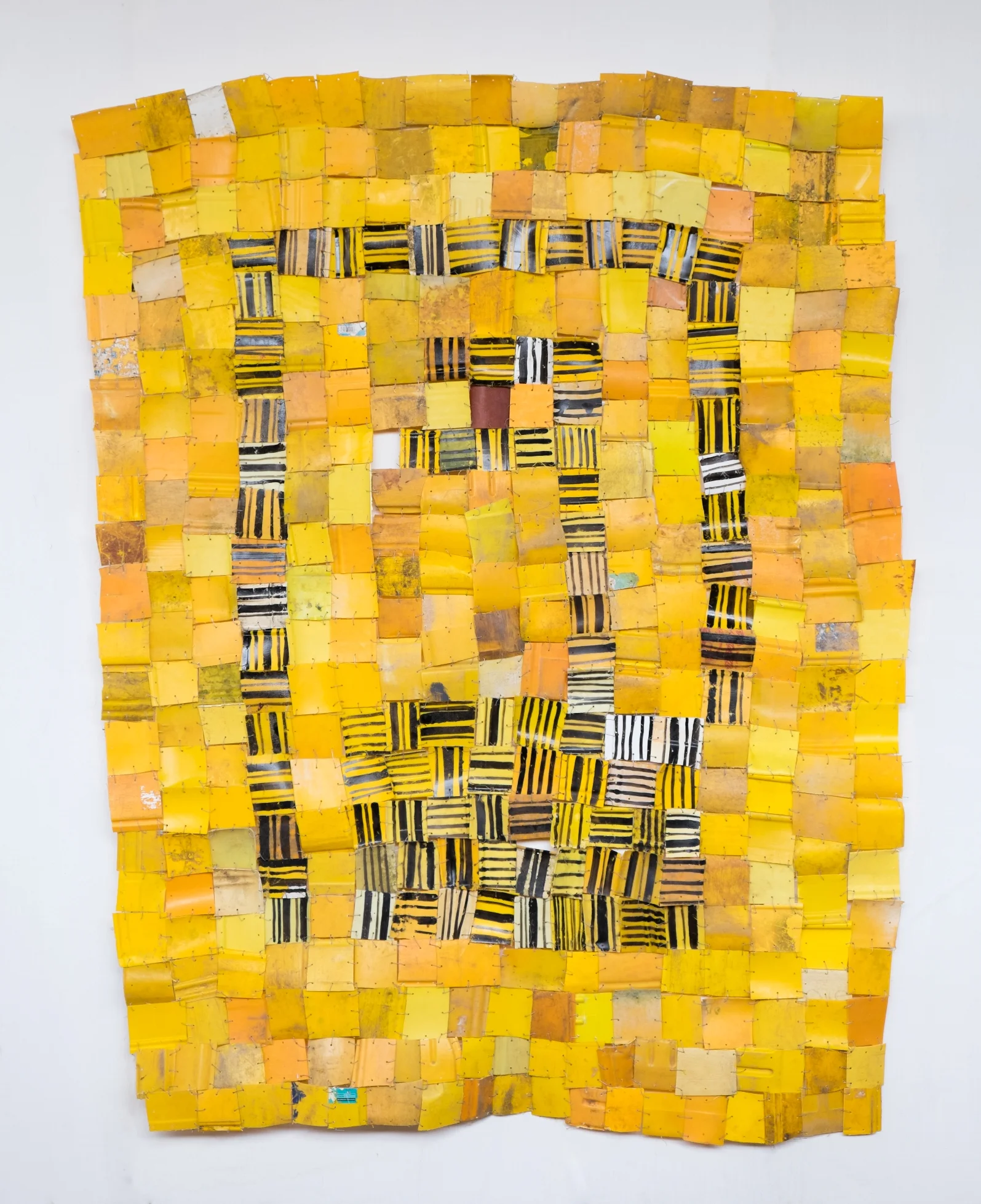 Serge Attukwei Clottey, Packed Community, 2016, plastics, wire and oil paint, 60'' x 78'', courtesy the artist and Gallery 1957