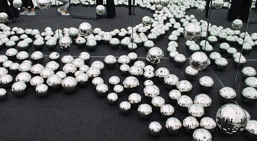 yayoi kusama, infinity mirror room- let’s survive forever; festival of life, david zwirner,image © designboom