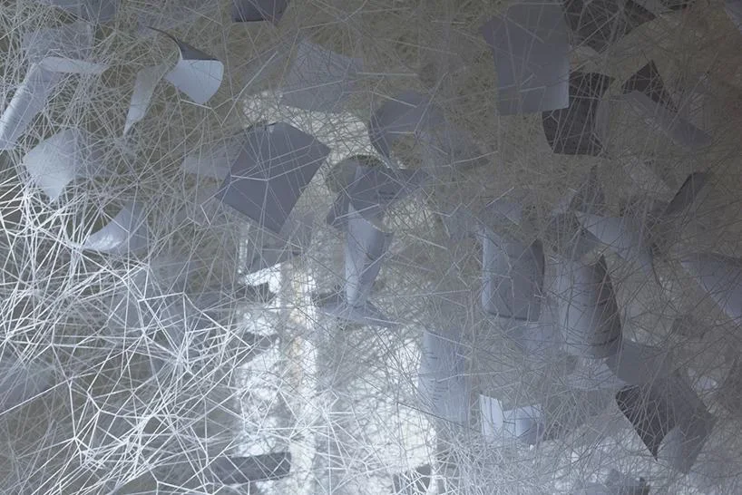 chiharu shiota, beyond time, 2018 | white thread, metal piano, musical notes © VG bild-kunst, bonn, 2018 and the artist, courtesy yorkshire sculpture park | photo © jonty wilde