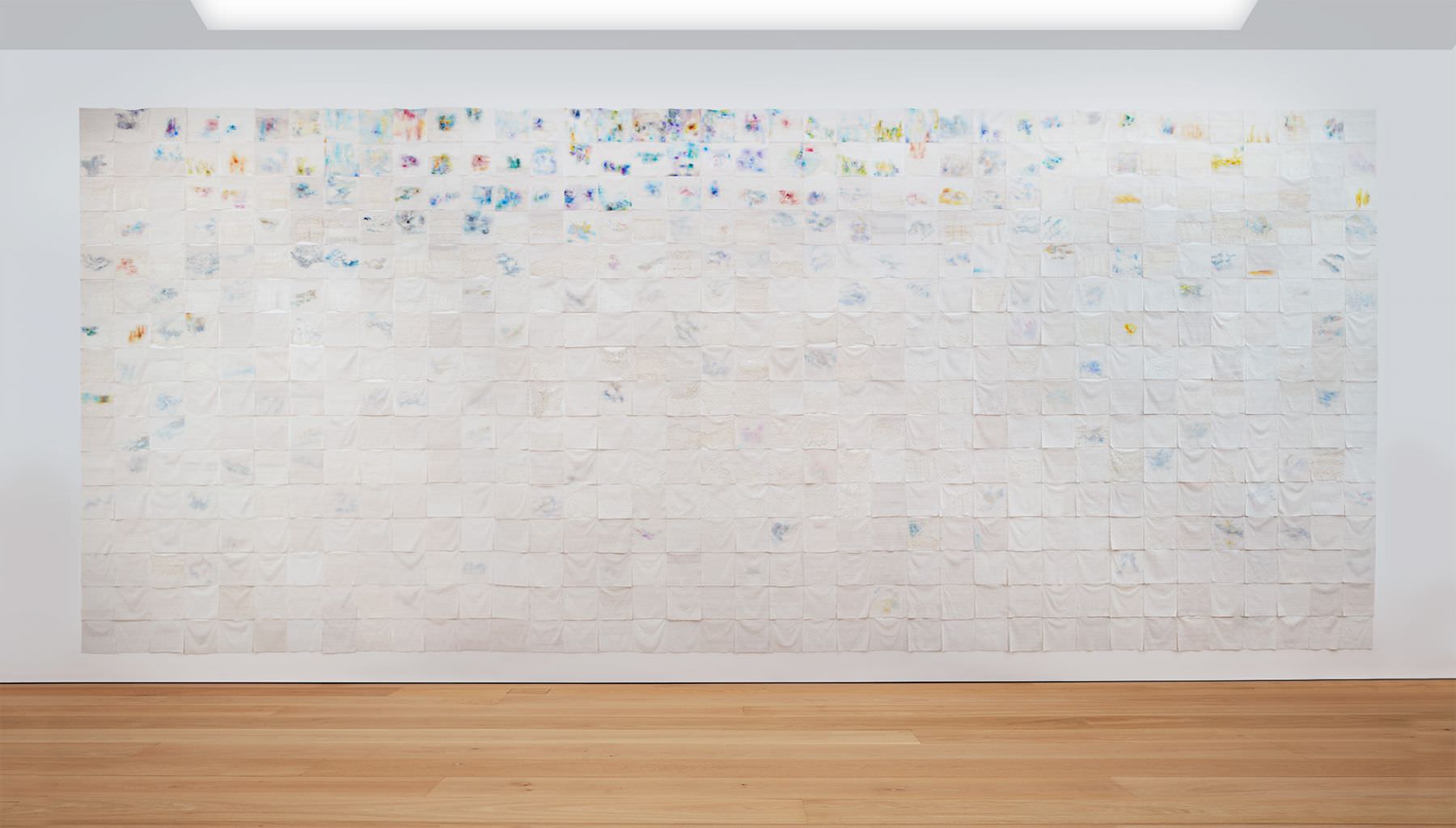 LIZA LOU The Clouds, 2015-2018 site-specific installation of oil paint on woven glass beads and thread on canvas 600 parts, each 35 x 35 cm; Courtesy the artist and Lehmann Maupin, New York, Hong Kong, and Seoul. Photo: Matthew Herrmann