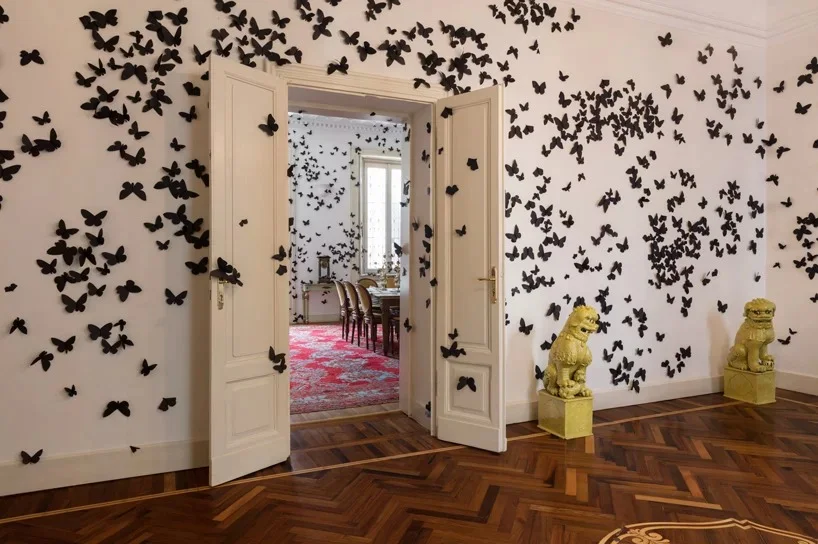 carlos-amorales-accursed-hour-fondazione-pini-designboom-1.jpg