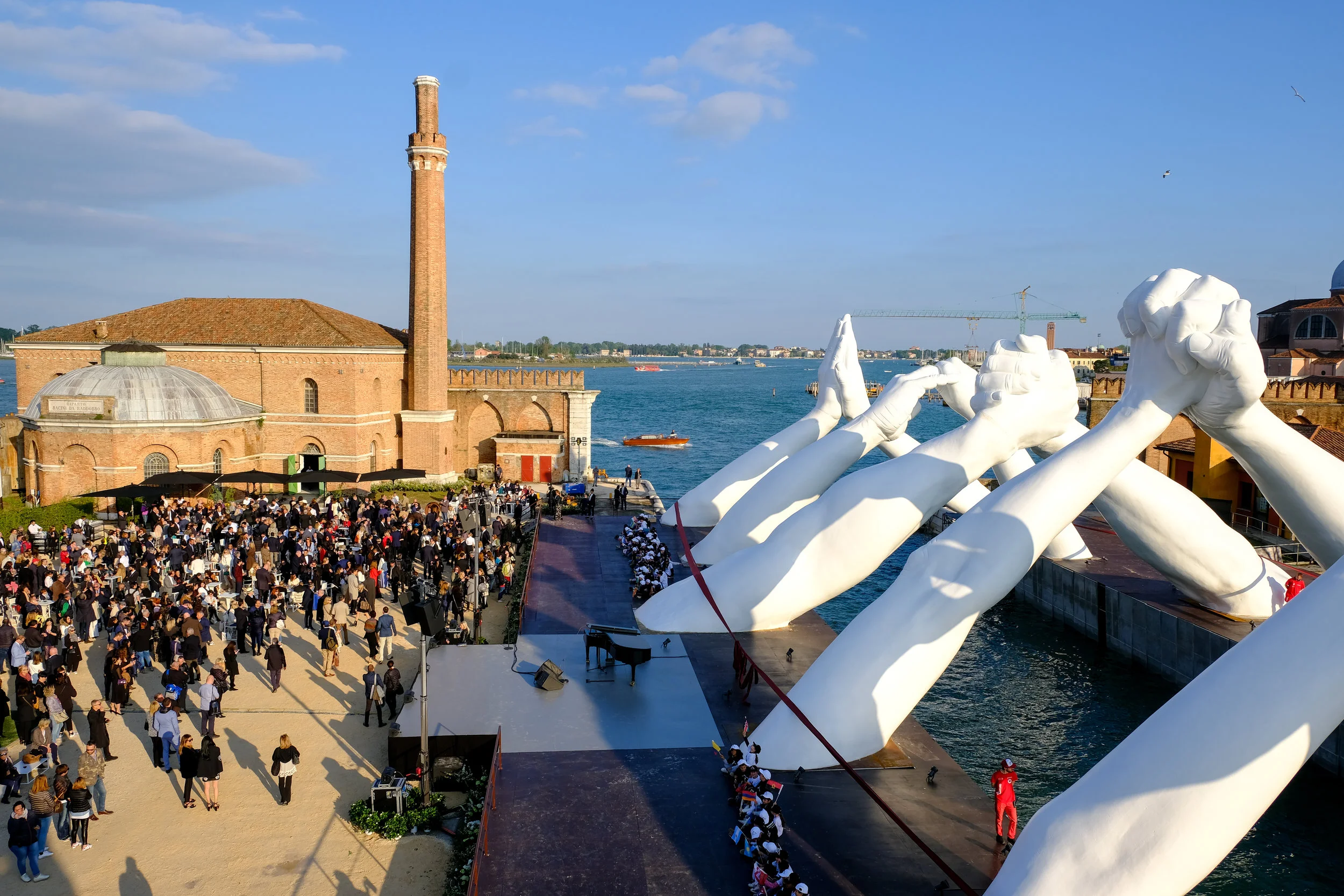 VENICE, ITALY - MAY 09: Lorenzo Quinn’s Building Bridges by Halcyon Gallery during Venice Biennale 2019 on May 09, 2019 in Venice, Italy. (Photo by David M. Benett/Dave Benett/Getty Images for Halcyon Art International)
