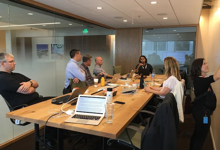 David Karrasch, Mark Sichel, Mark McKinney, Derek Whipple, Michelle Peterson and Margo Mayes from Salesforce.org brainstorming with Arturo Noriega, Founder and Executive Director of Centro Community Partners. 