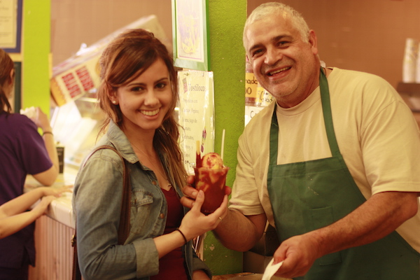 Luis Abundis, Owner of Nieves Cinco de Mayo with a client at his ice cream shop in Fruitvale, Oakland.