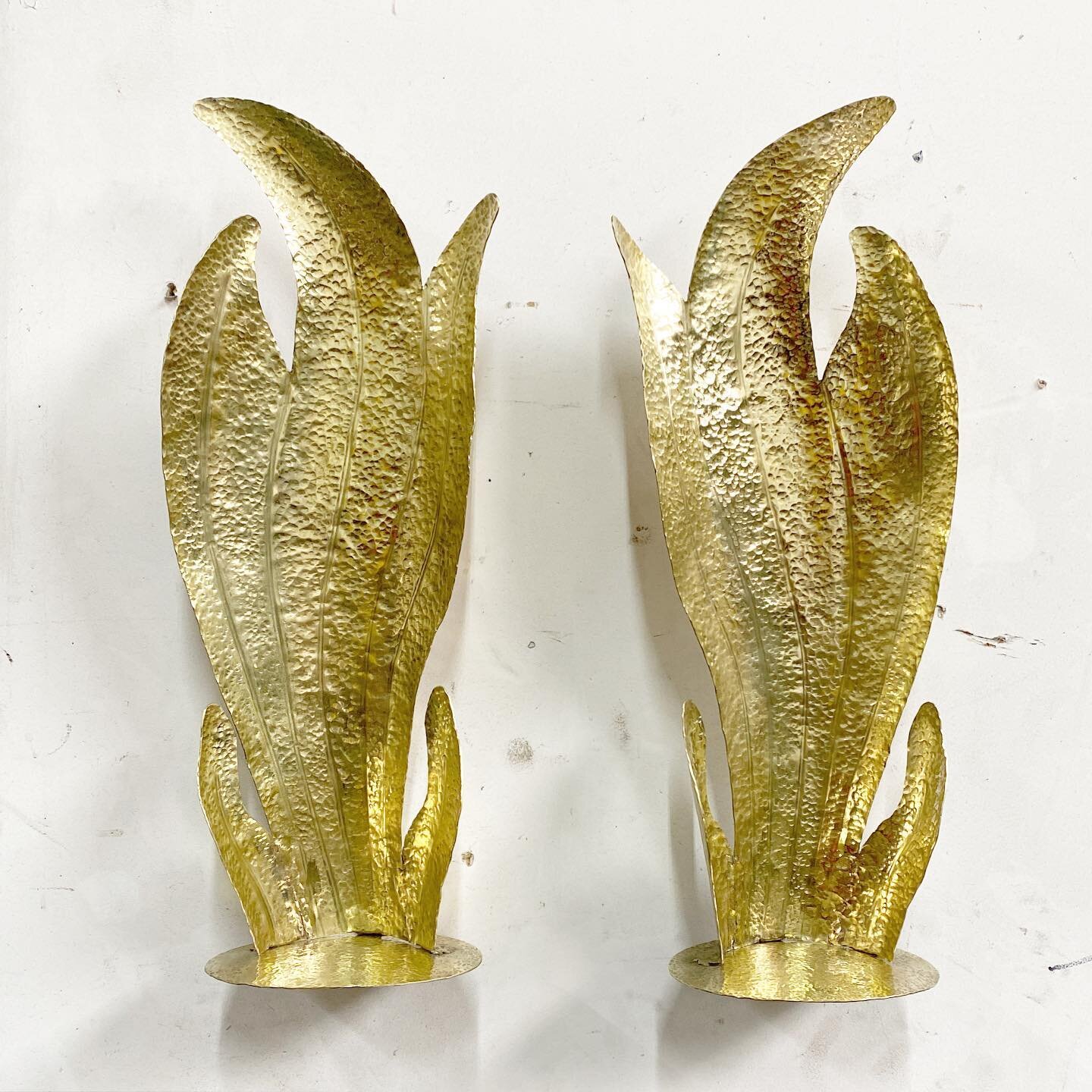 These hand hammered unlacquered brass sconces really came great. I believe they will flank a doorway. Always the option of a candle to illuminate the hammer marks. ......................................................................................