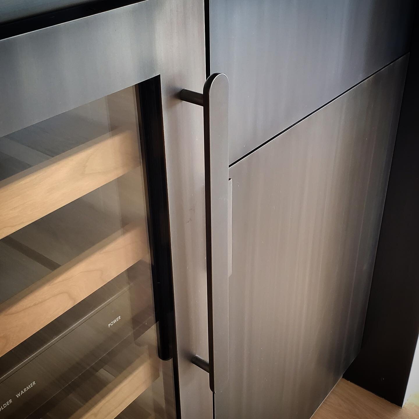 Custom appliance hardware adorn this wet bar location. As well as custom wine fridge door, cabinet cladding, countertop and back lit shelves. Scroll to see more including some of the machining. .....................
........ #wine #wet #bar #winecell