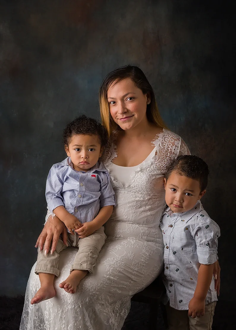 Mommy & Me photography is not limited to one child or one age. With multiple children, the session can include portraits of everyone together as well as individual photographs of Mom with each child.