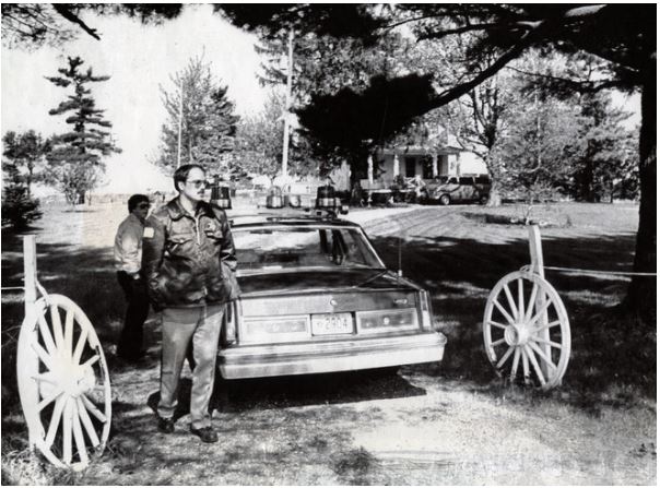 Iowa County Sheriff's Deputies in the driveway of the rural farm house near Mineral Point, WI. Courtesy: ABC News