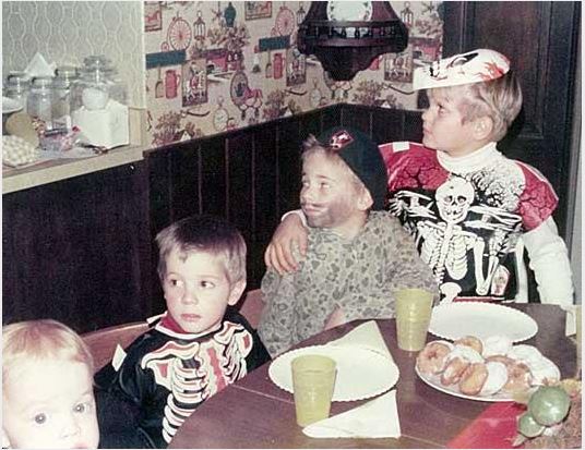 Peter with his arm around his adopted brother Perry. Peter is dressed as a skeleton (far right). Courtesy: ABC News