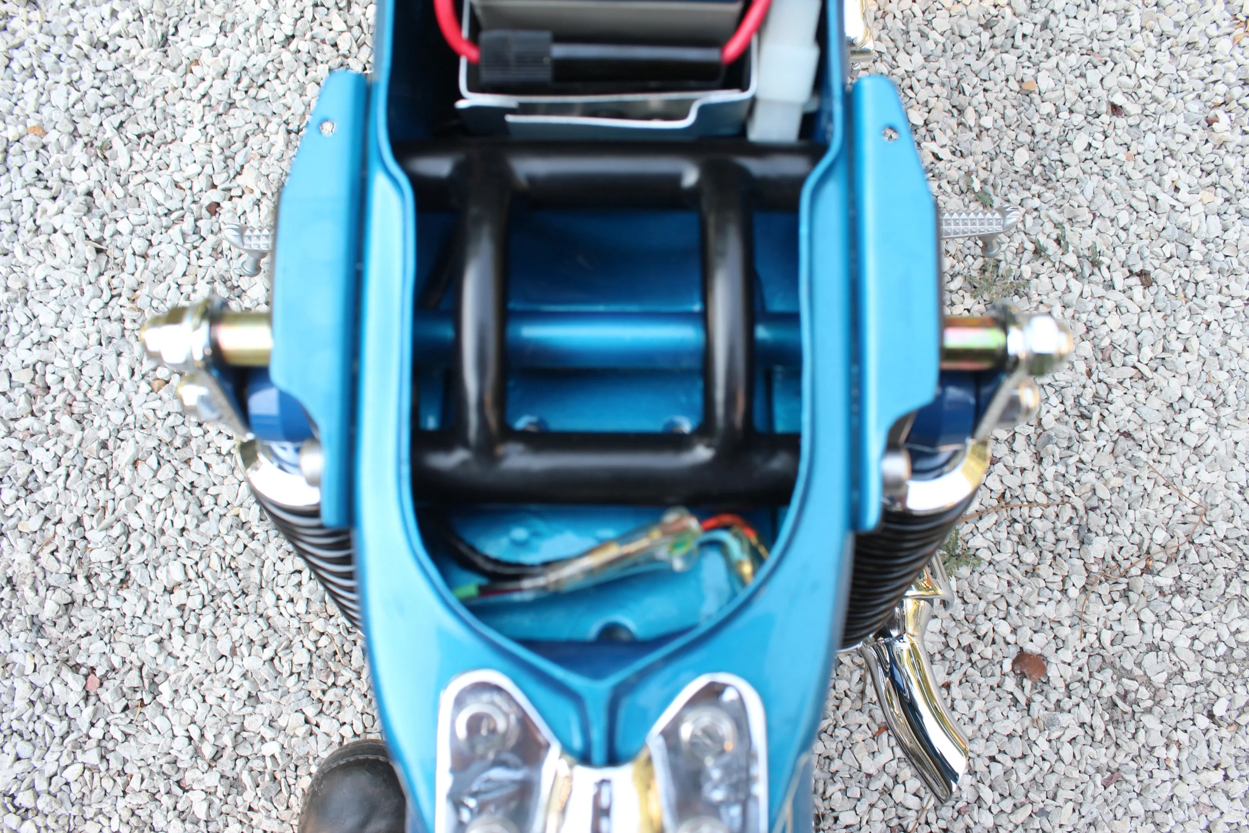   A good deal of work was done to stiffen the suspension and frame. An internal rear shock cross brace and heavy duty shackled shock mounts address the weak link in the stock set-up. 