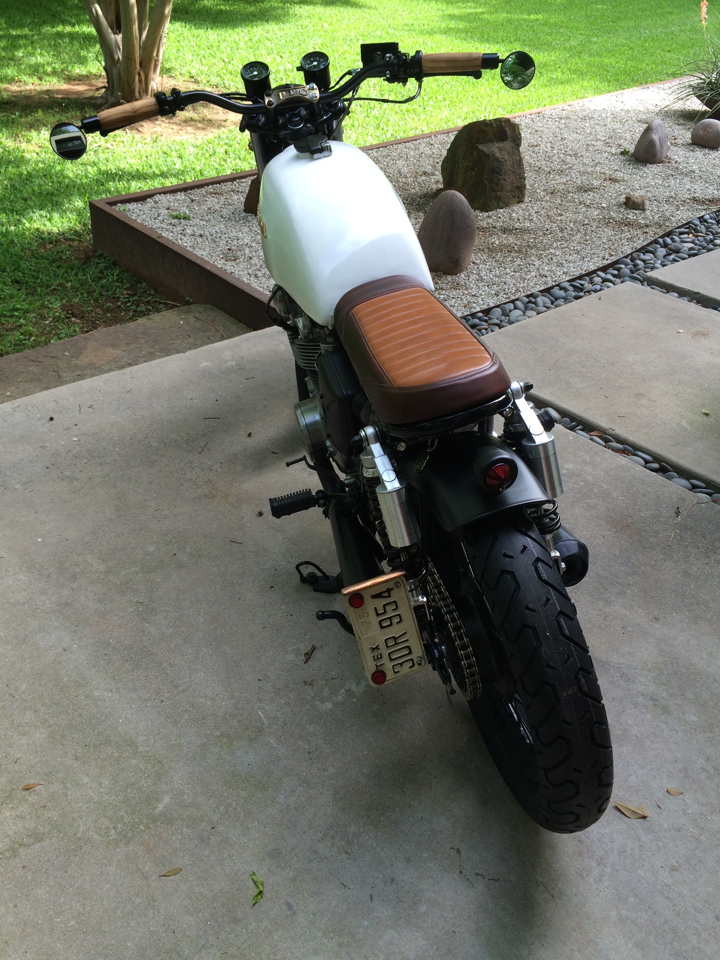 This was the first time the completed bike was rolled out of the shop. The same crash cymbal metal was used to form a hood for the license plate light.