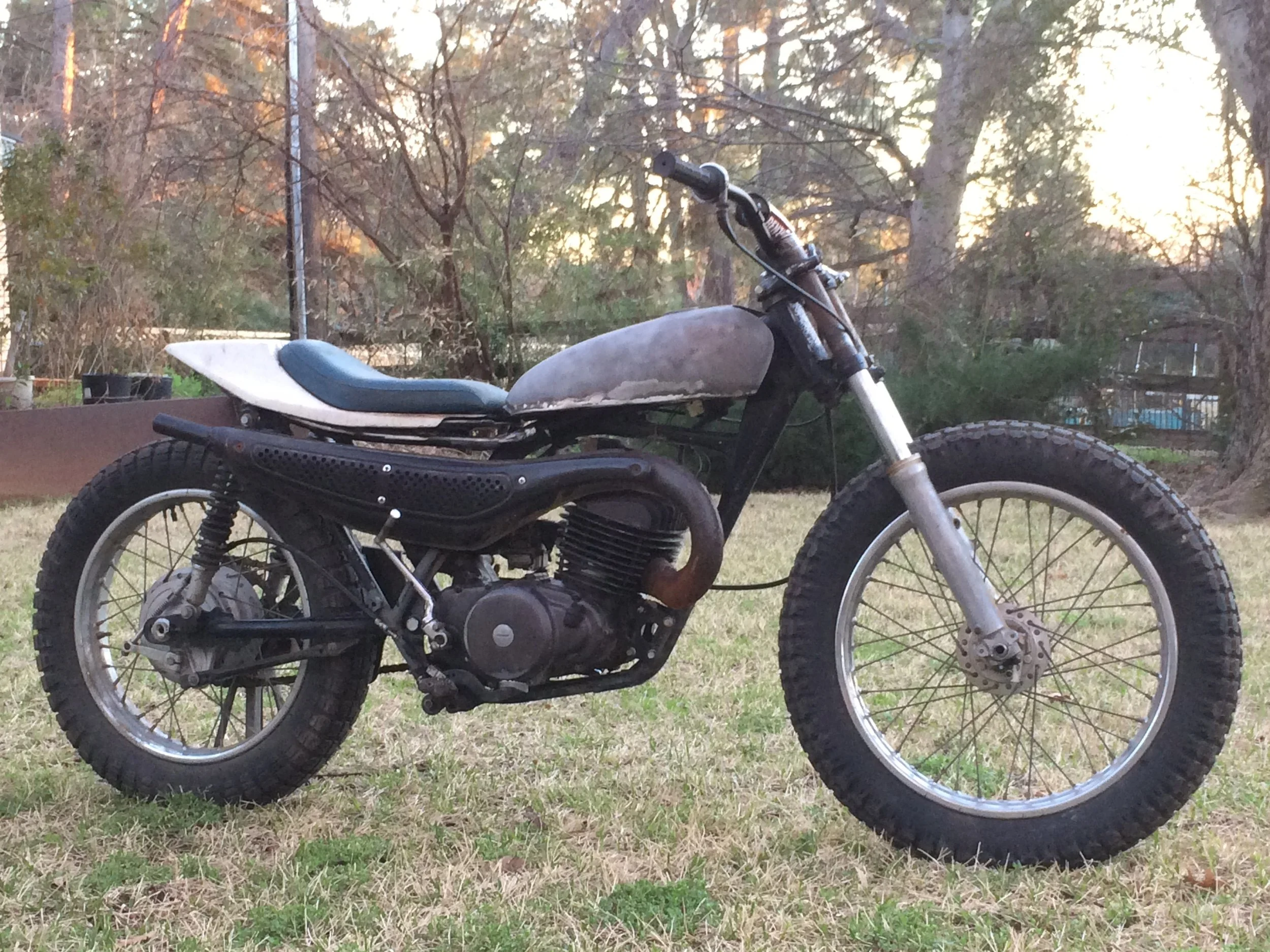  Prior to tear-down. These are the rather large tires that came on the bike. The bike came to me with what appeared to be a CB450 front end. The triples were kept, but shortened MT250 forks were used. 