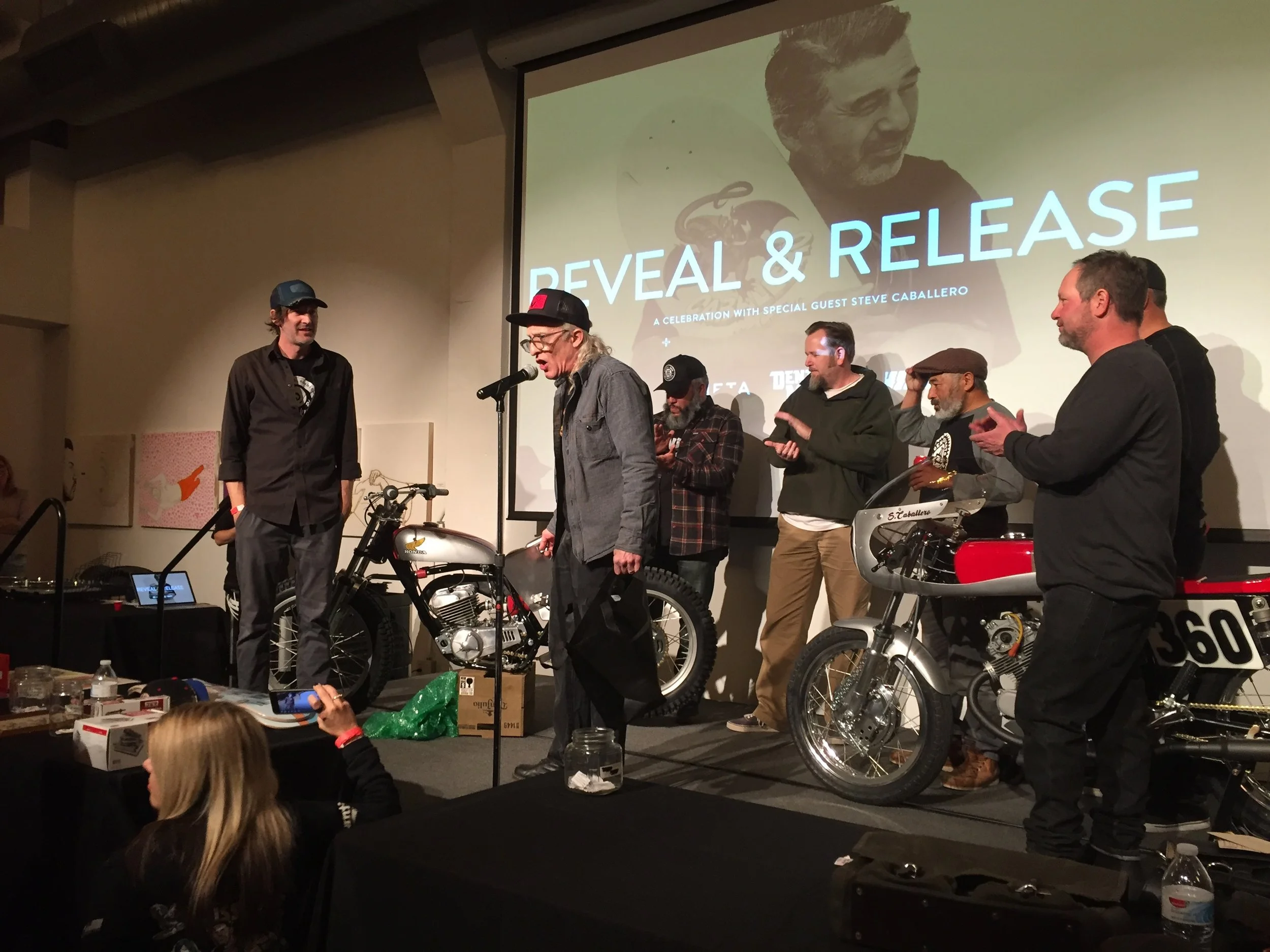  At the December reveal, left to right: Peter Salisbury, local radio KUZU FM founder who spun discs that night; me blabbering on the mic; DentonMoto co-founder Fabian Campos; Pinstriper Wade O. Wilson; Guest of Honor Steve Caballero: The back of John