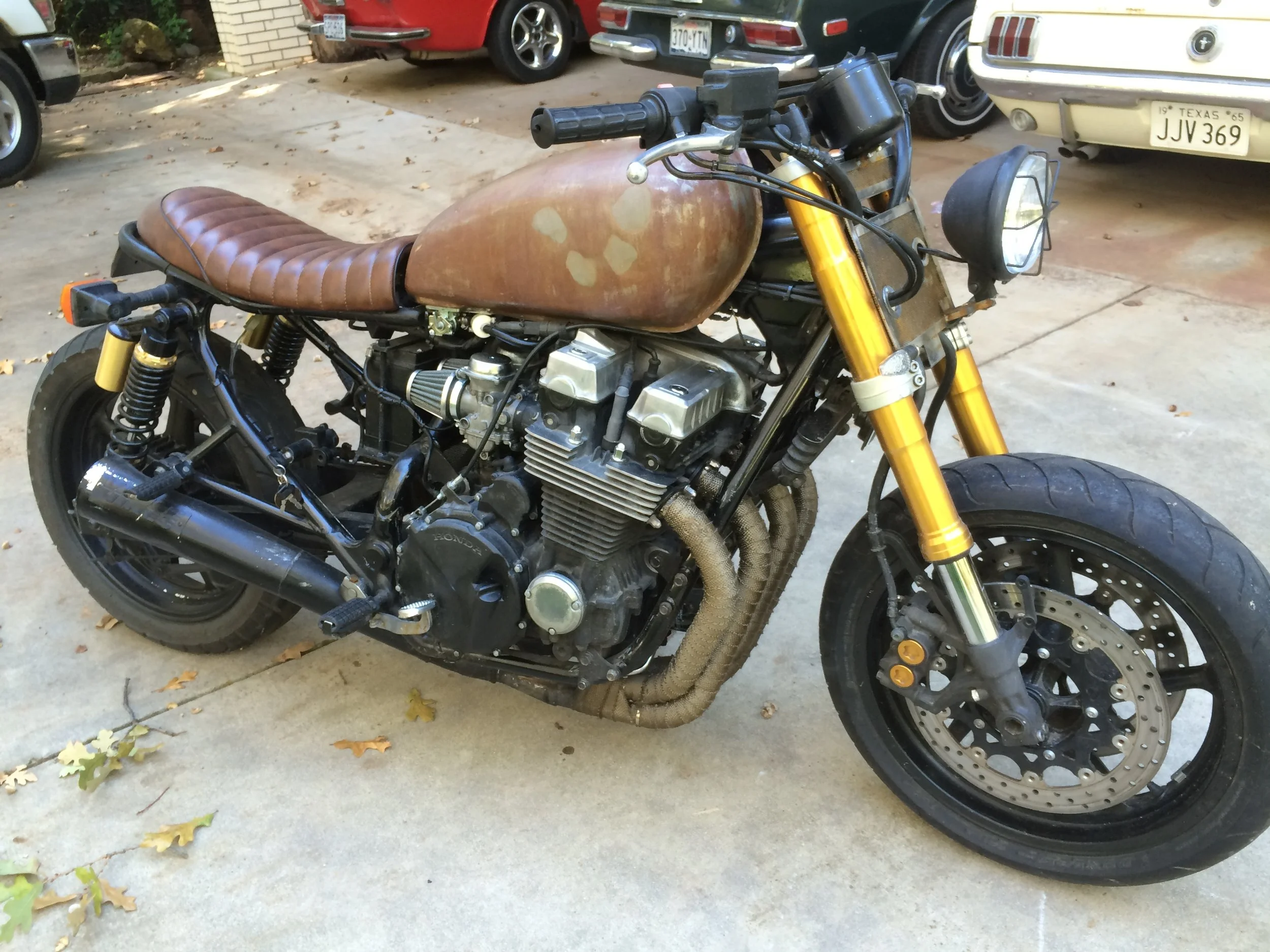  The donor bike was found in Denver, and had already had the R1 fork conversion as well as a Walking Dead tribute styling. The 1993 CB750 Nighthawk rear frame said: “cruiser,” and had to be dealt with. A new top tube for the rear frame was formed fro