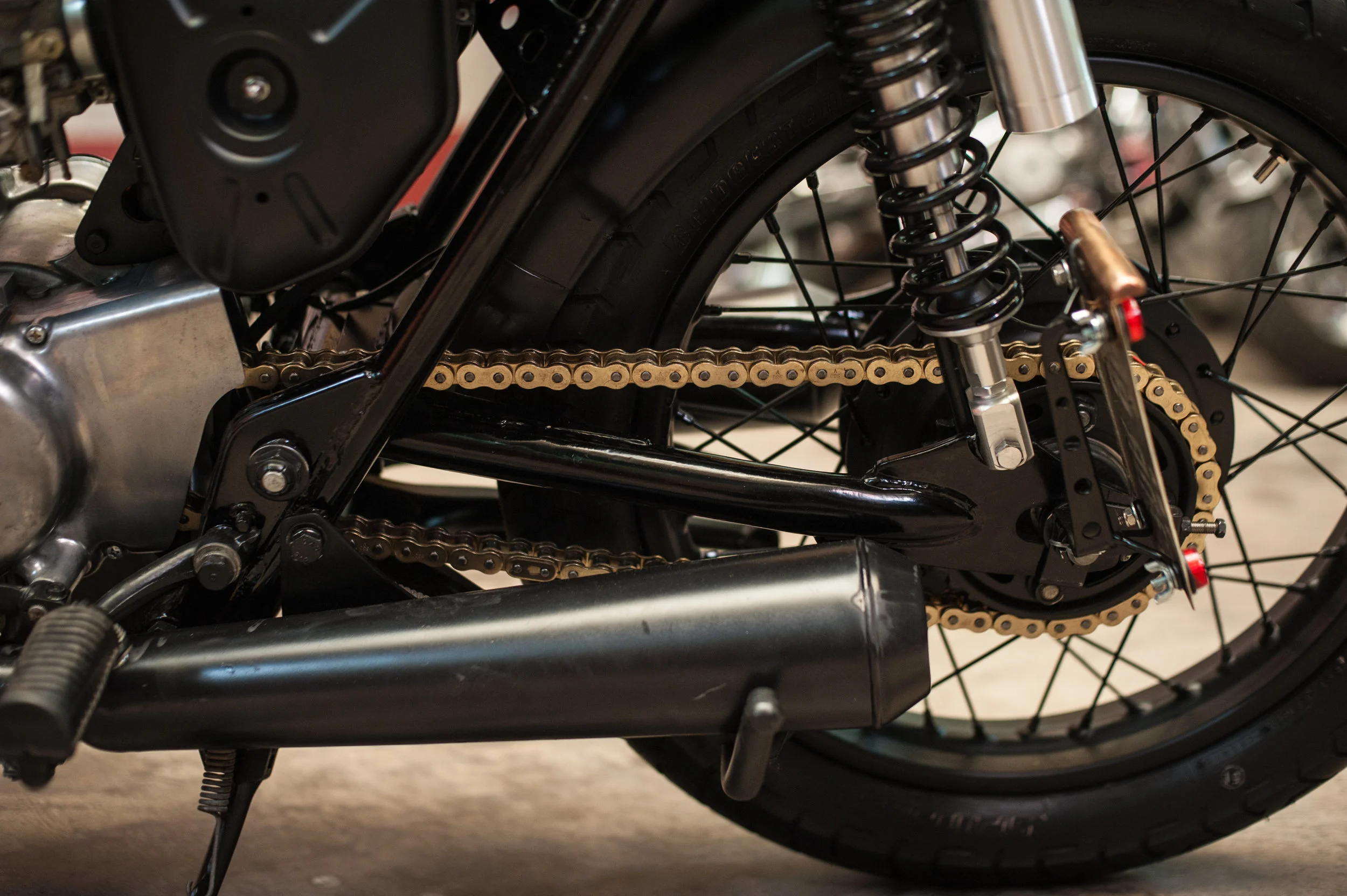 The CB550 mufflers use the stock CB500T clamps and gaskets welded to the front of the can, allowing them to be removed or changed out easily.