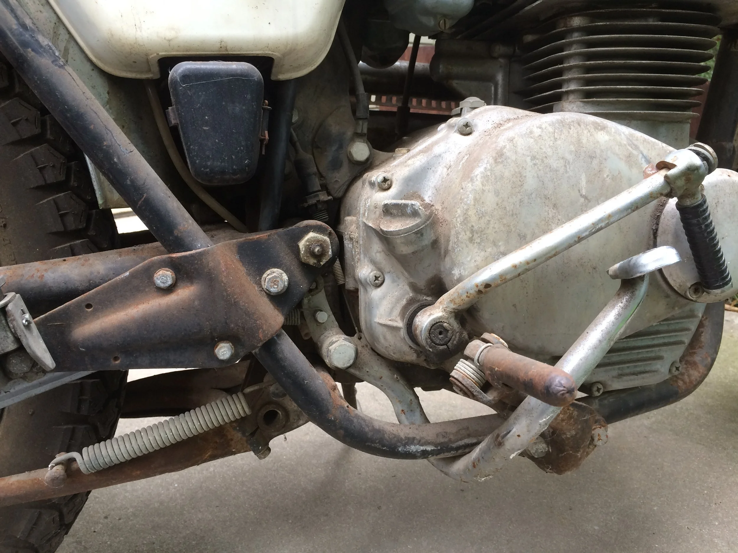  The bike had been stolen and found wrecked, with the brake pedal bent up, the kicker flopping around and footpegs bent. 