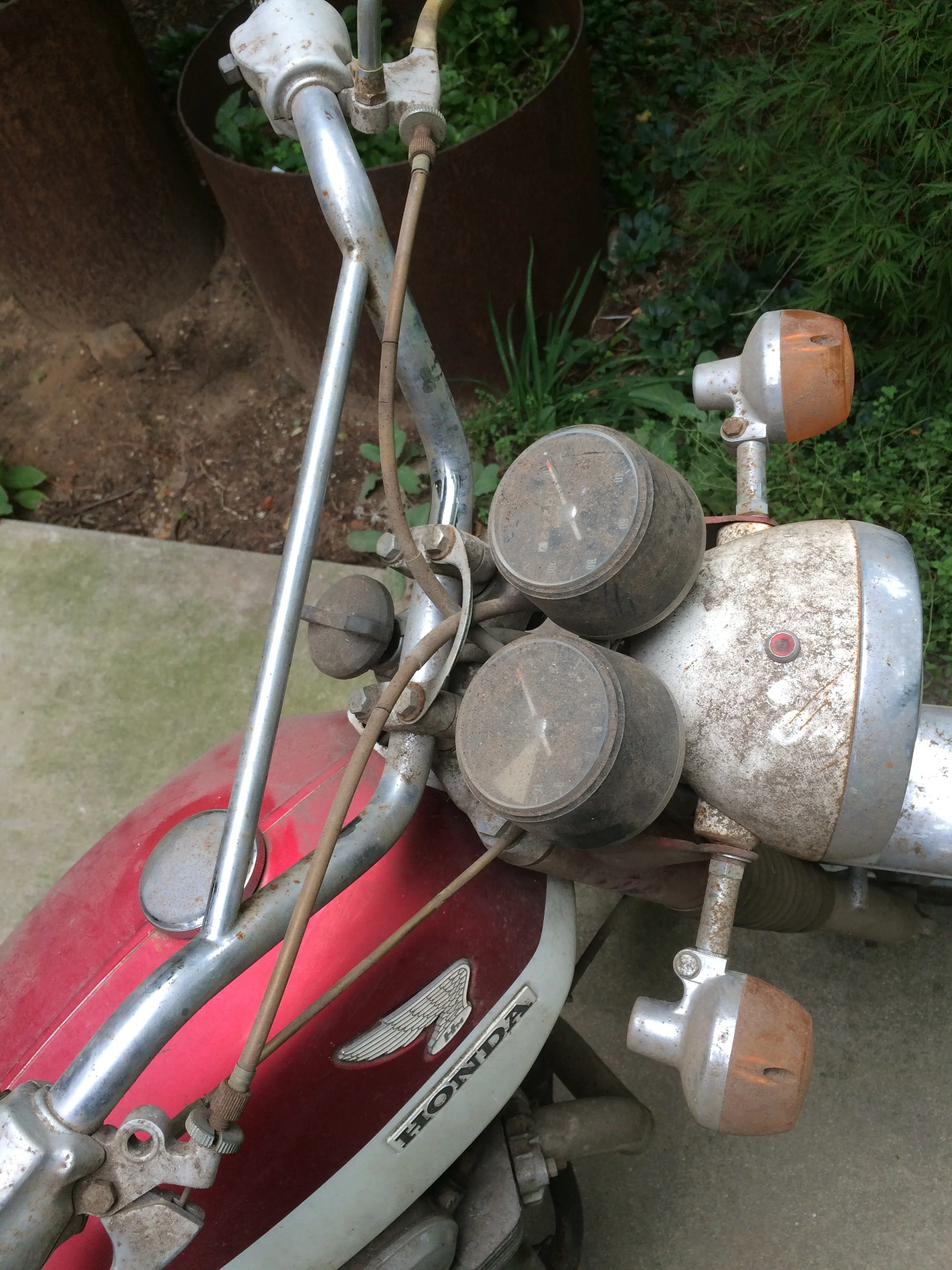  Before and after of a 1969 CL350 sympathetic restoration. The original paint was kept on the fork uppers and tank. Original chrome was used where practical, with NOS and quality used pieces used. 