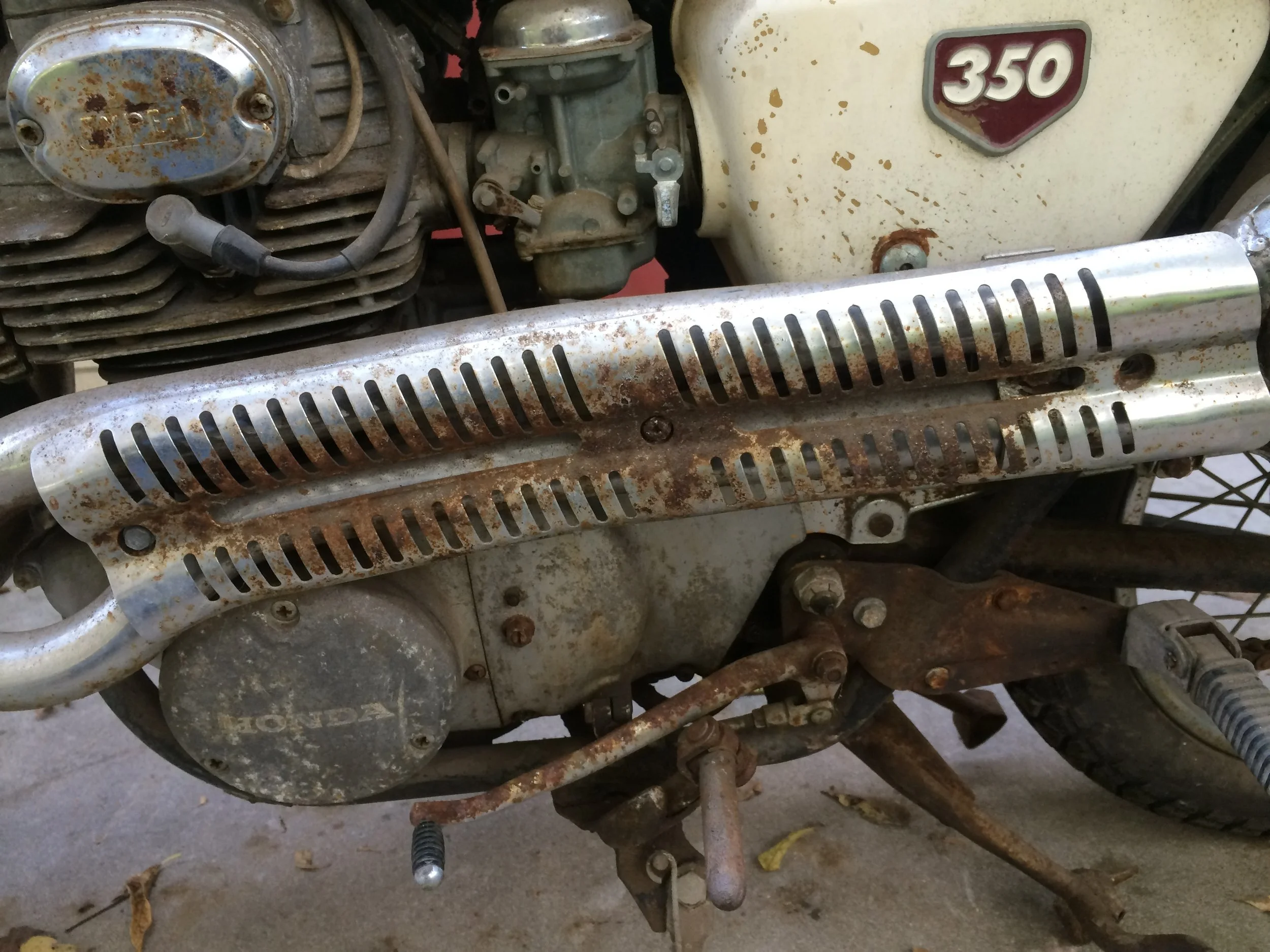  Some of the worst of the worst on the 1968 CB350 prior to restoration. It appears there was a leak and splashing concentrated on this one area of the bike. The other side was not as bad. 