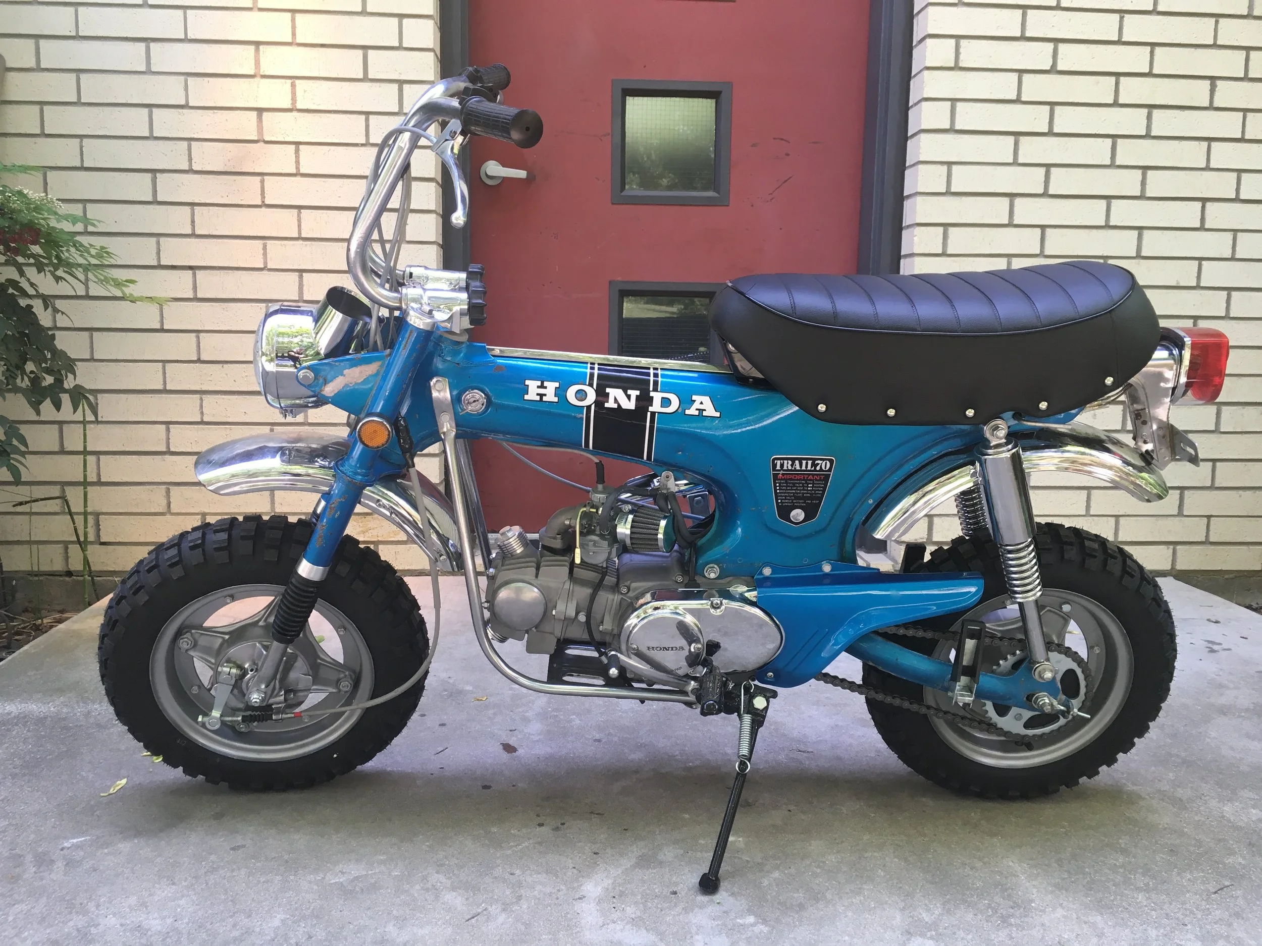  1971 Honda CT70 K0. This one started with a frame only. A total rebuild of a correct K0 engine into a 108cc stroker with high volume oil pump, 20mm carb, heavy duty clutch, and race head and cam. Every part of this bike has been restored and is func