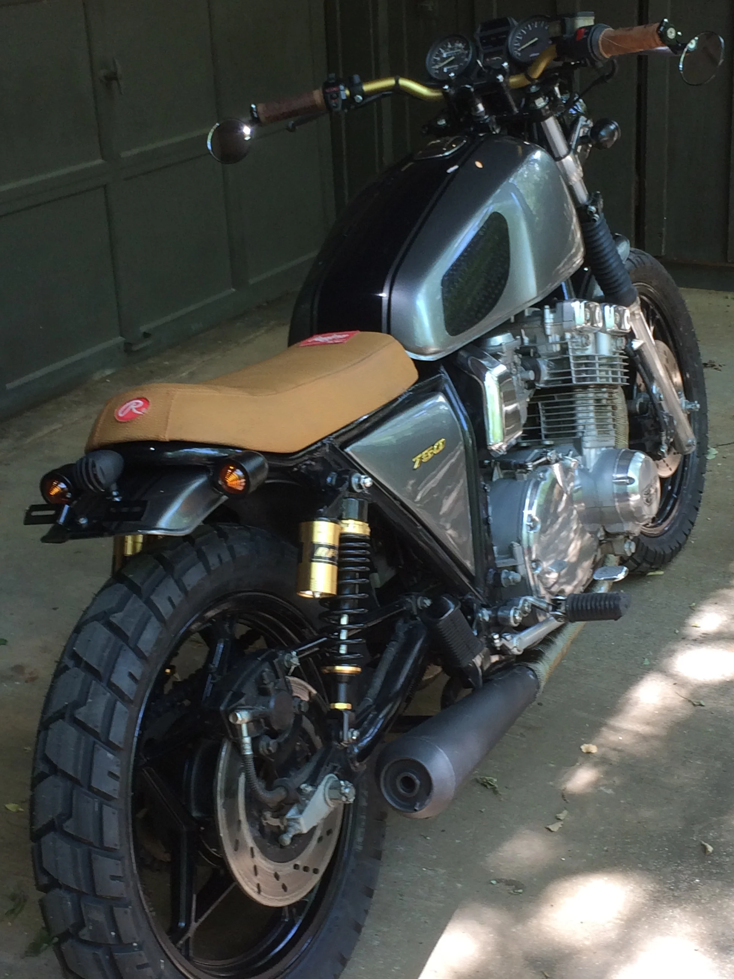  Keeping with the baseball touches on the bike, the Rawlings patches from a used glove were applied to the seat.  