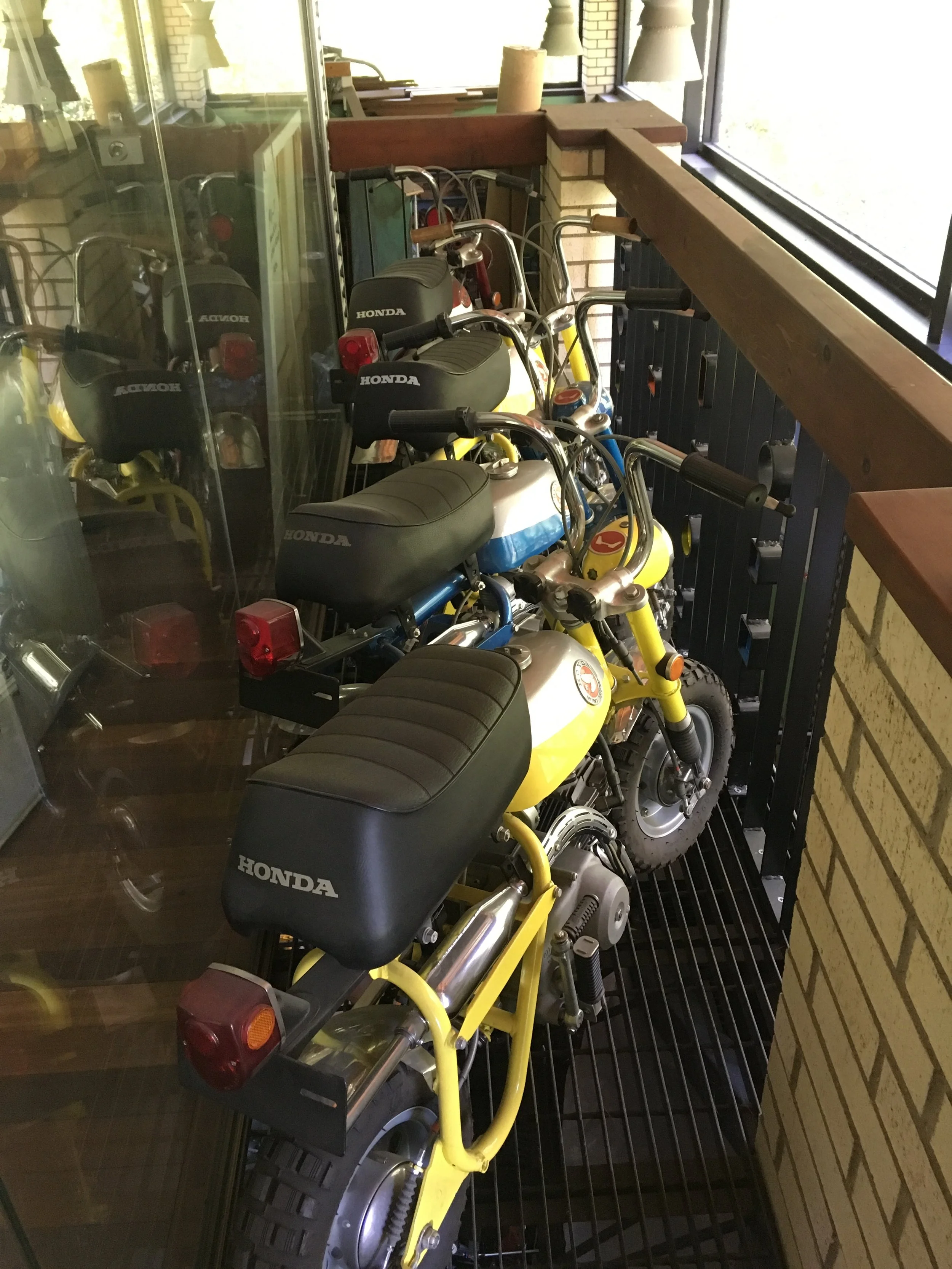  A couple of 1969 Z50’s, a ‘68, and a ‘71 on the upstairs catwalk in the shop. These were done around 2010-2012, and have not been ridden since restoration. 