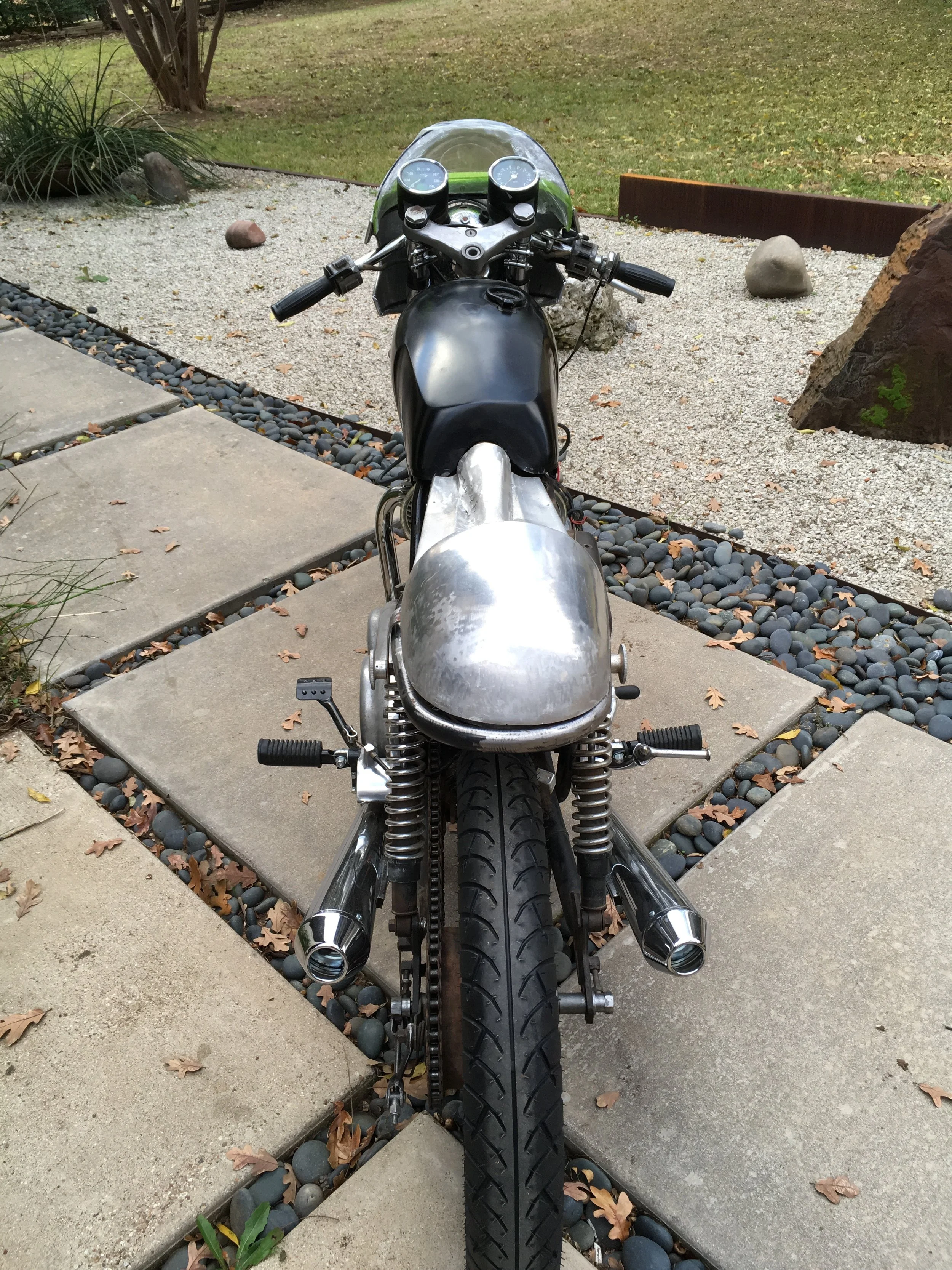  The rear frame loop was shortened and turned upward, and a new seat sub frame made to mount the aluminum pan and hump. 