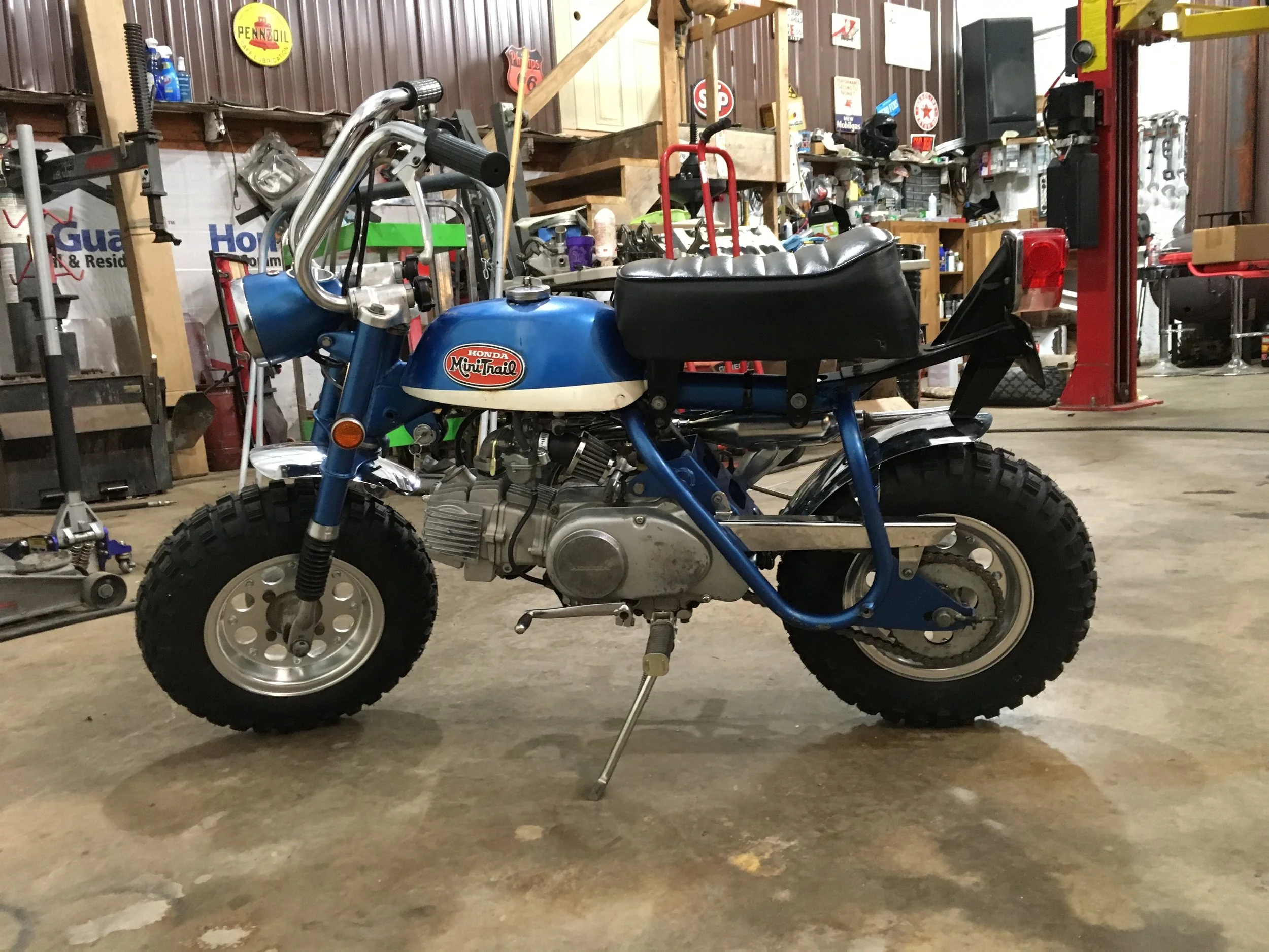  The entire footpeg assembly was replaced with a newer OEM unit, drive chain and counter sprocket changed out, and a new wire harness and key switch were used. 