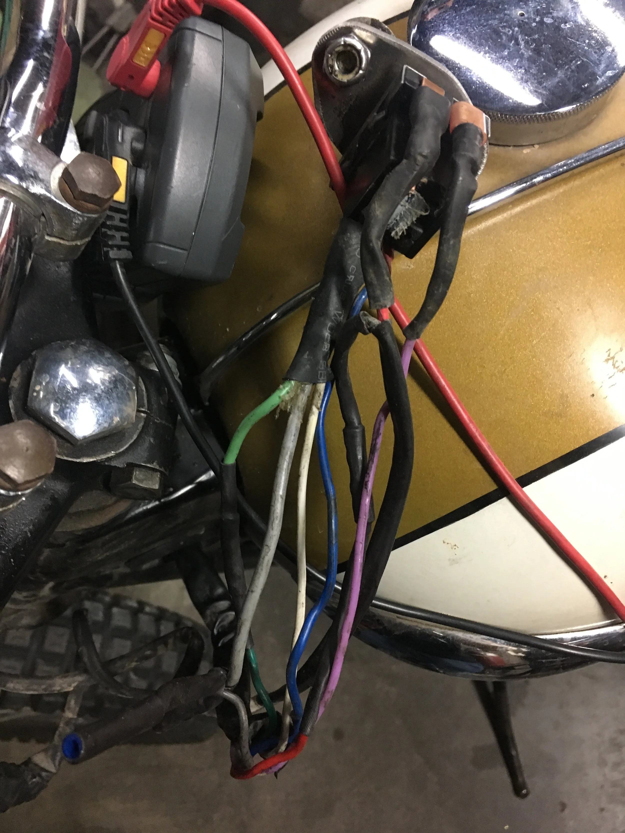 Here is where the problem starts. The wiring on this bike appears to be all custom, and further investigation found the brake switch wires were both hard wired with the power from the battery! This means the brake light would be constantly on with n…