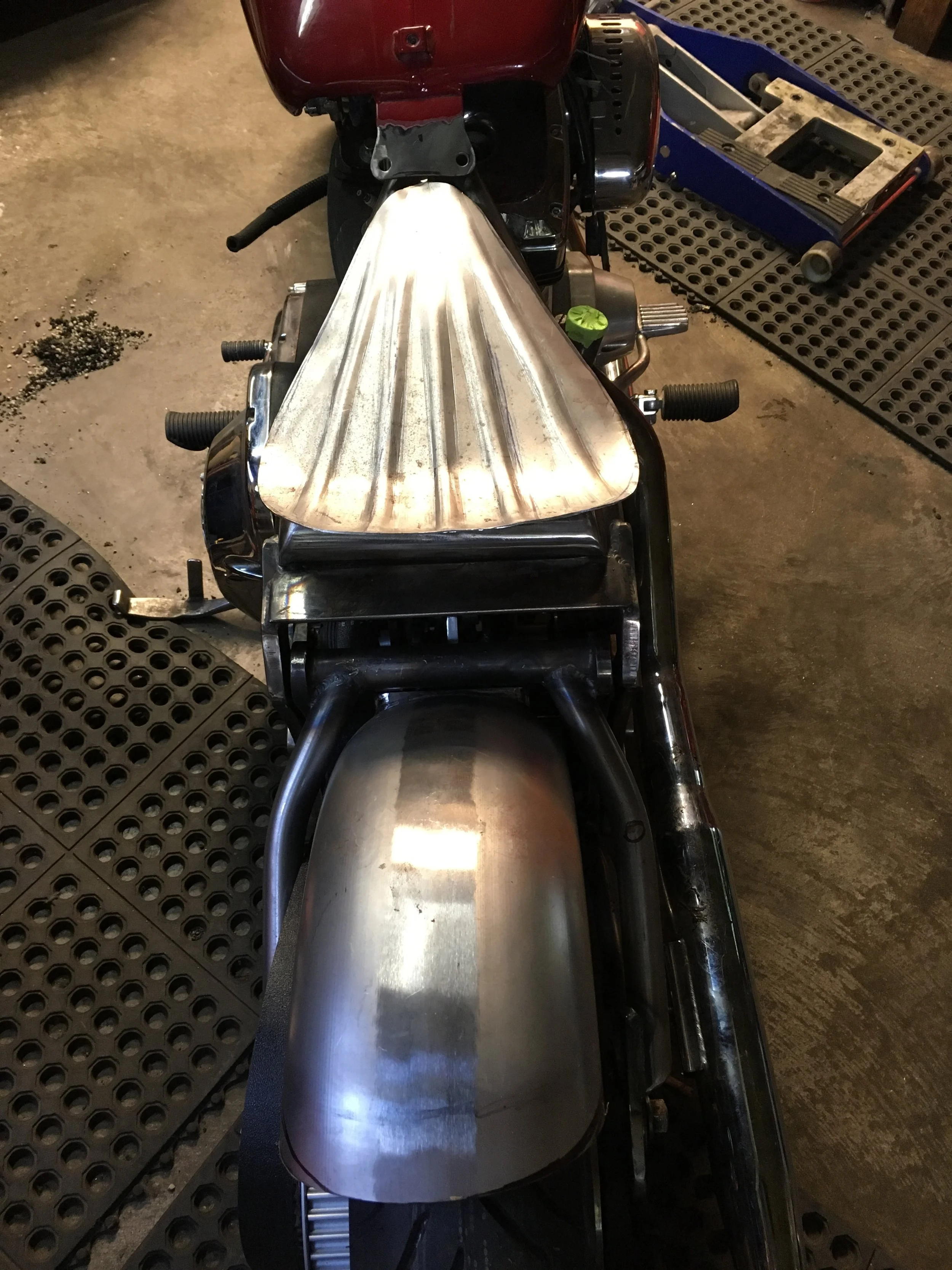 Some ribs were put in the pan using the Jet Tools English wheel. The shrinker/stretcher was run around the back edge to strengthen and smooth it out.