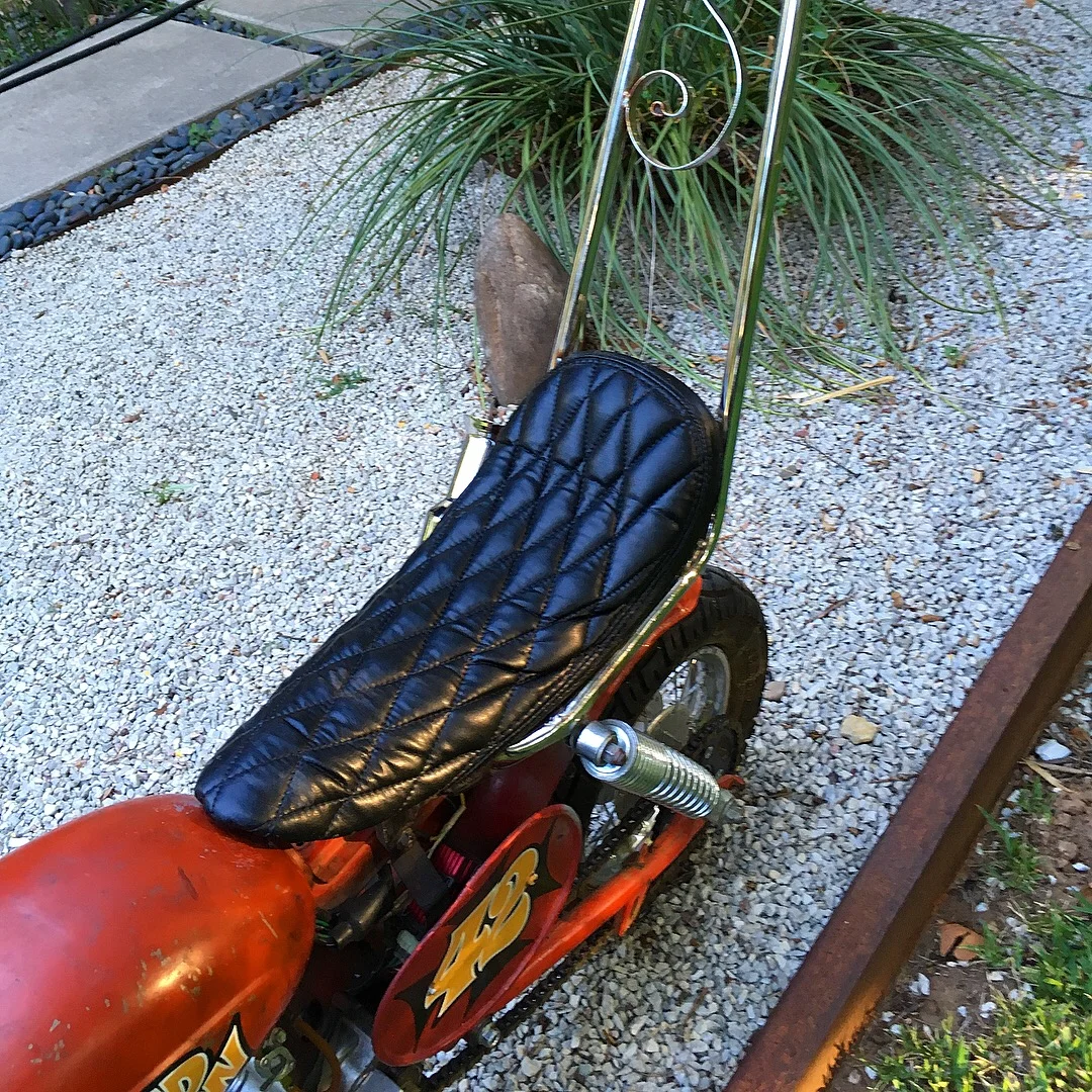  The seat cover was taken from a reject custom seat another customer ordered online and left behind. Recycling has always been a big part of what goes on in the shop. 
