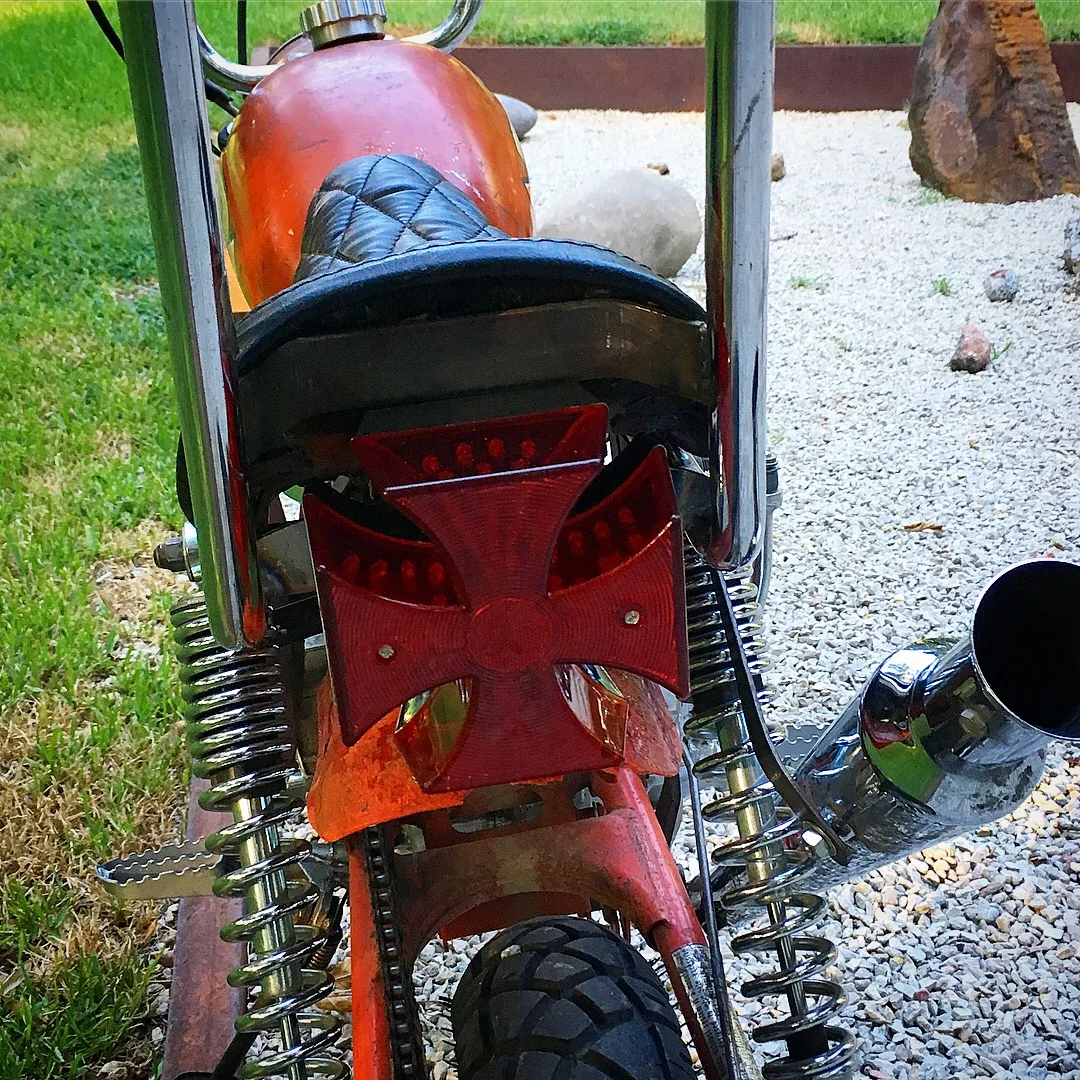  Ben found this LED Maltese cross tail light. It definitely fits the theme of the bike and is super bright! 