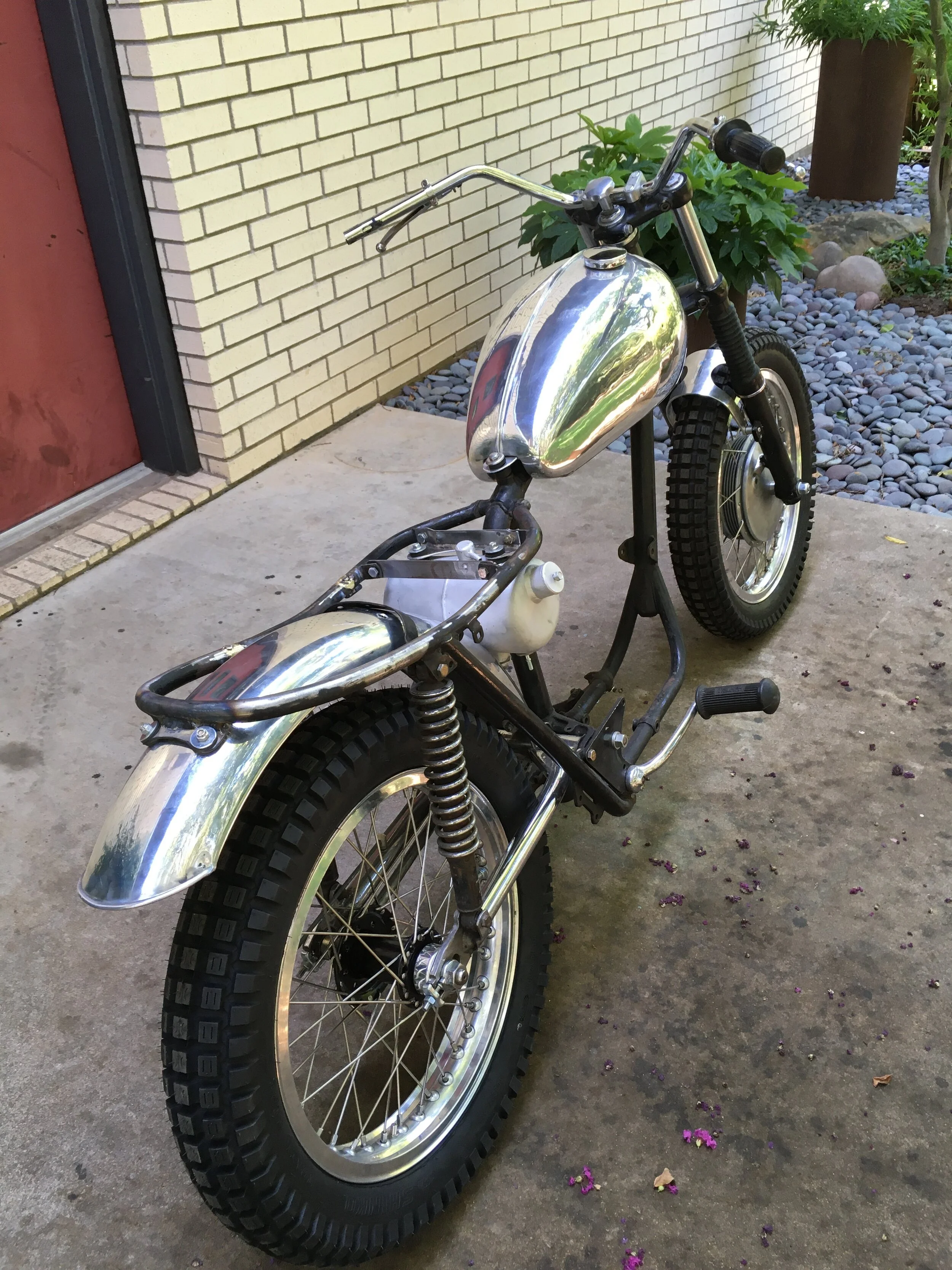  Started in 2020, this bike came to me as a true basket case. While the engine was in the bike, the pistons were missing and the cylinder and head just laid on top. Coffee cans of disassembled parts were labeled and fairly well organized, but the con